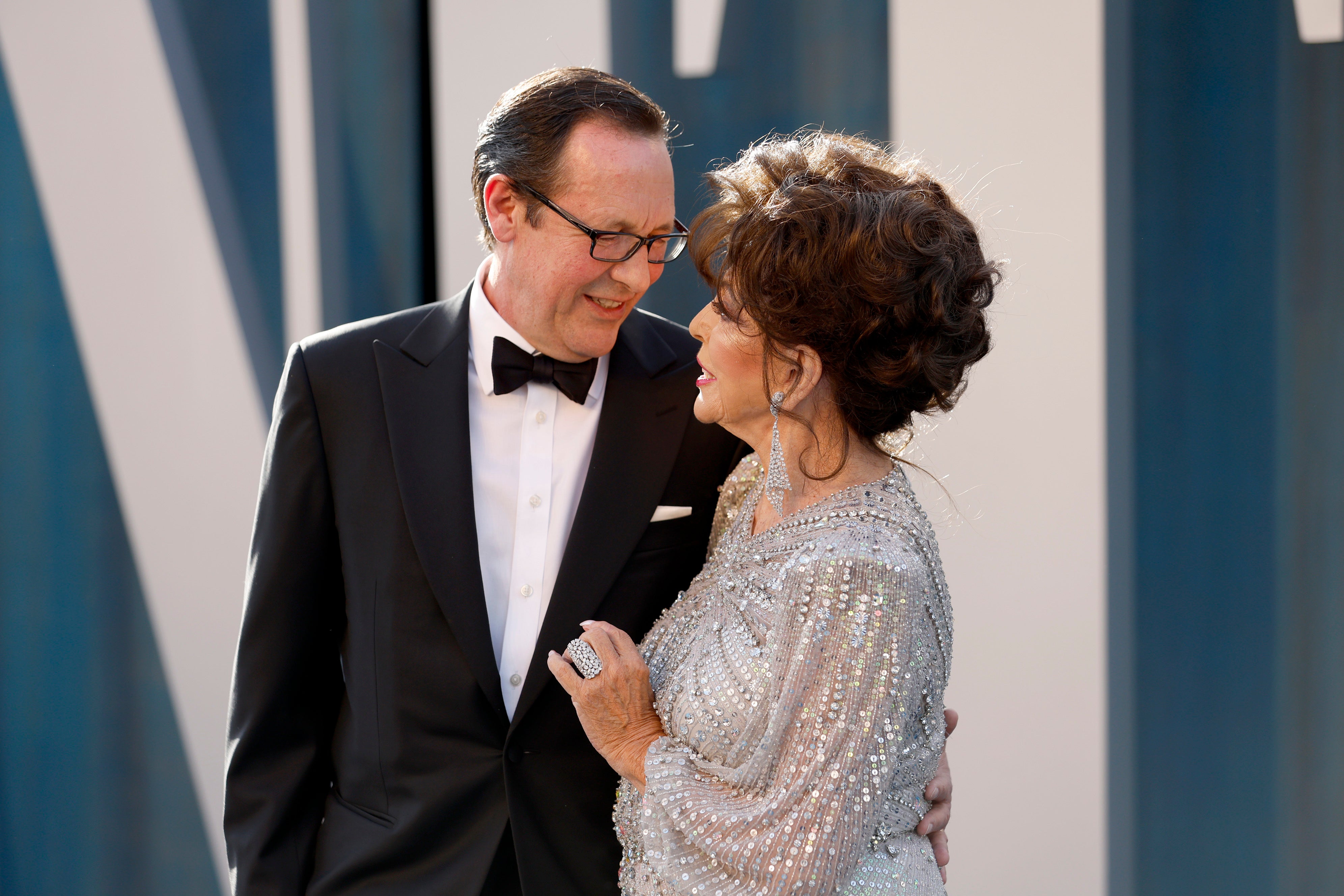 Collins and her husband Percy Gibson attend the 2022 Vanity Fair Oscars party