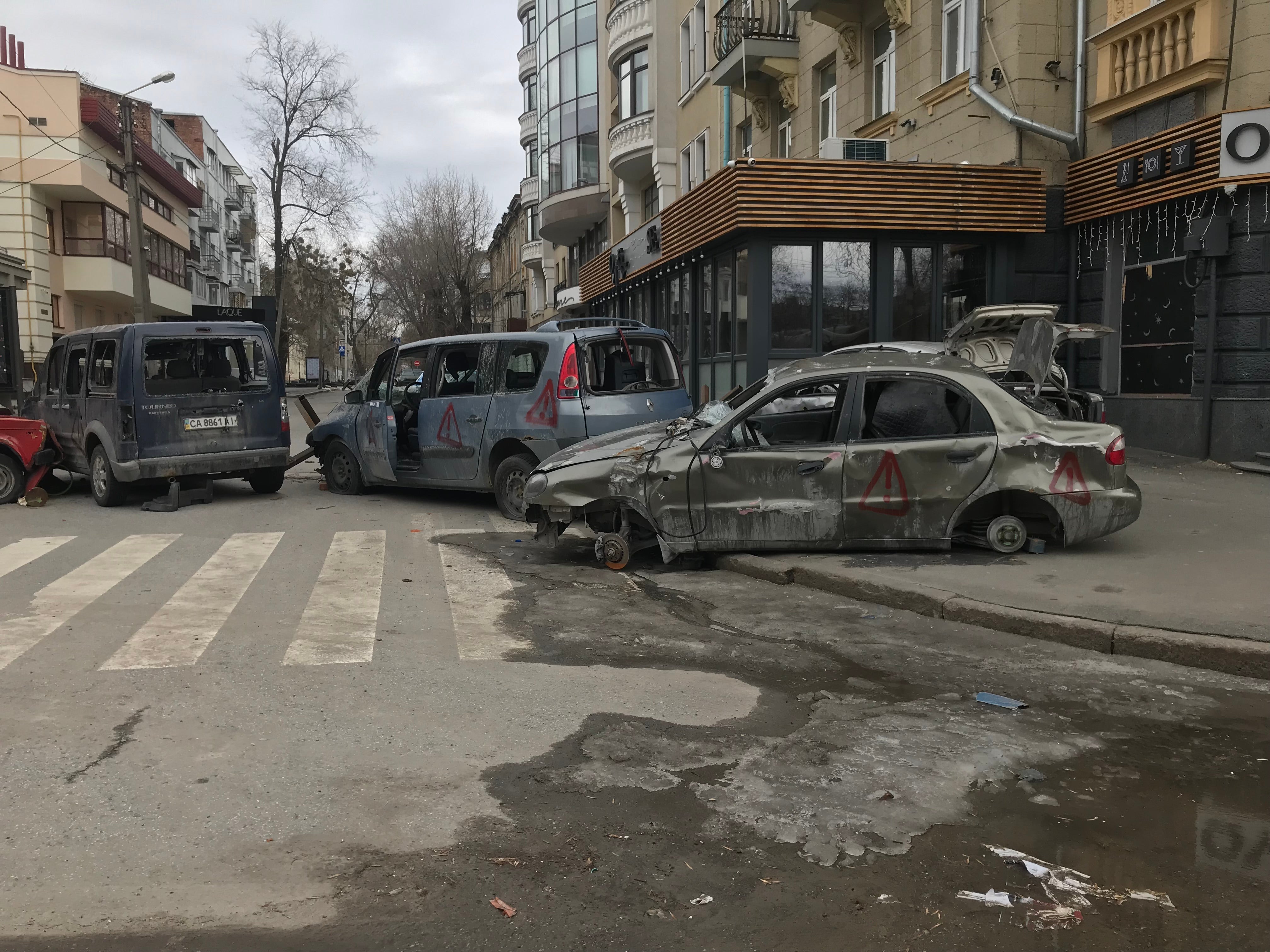 Cars hit by shelling in Kharkiv