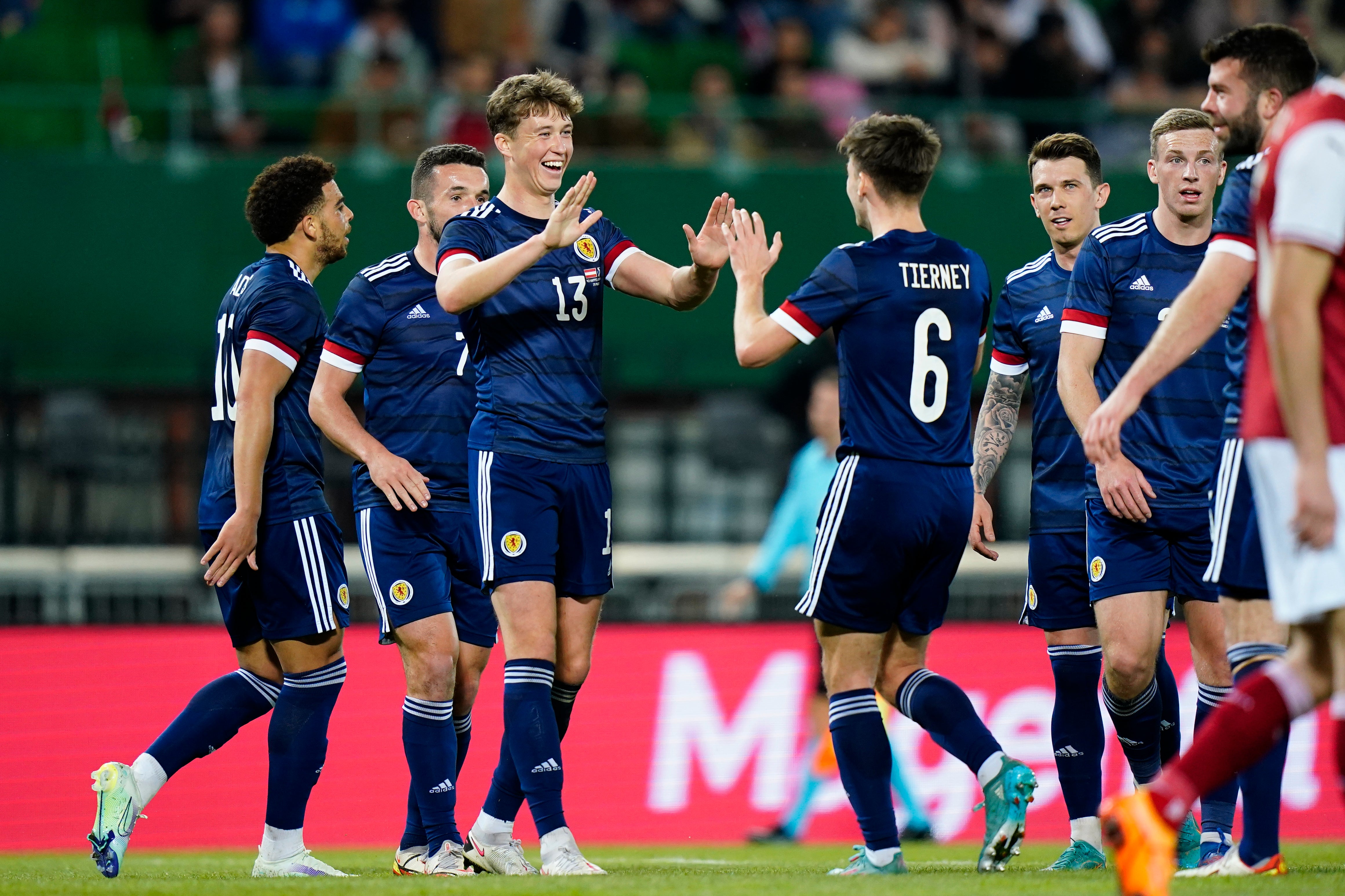 Jack Hendry (centre left) opened the scoring for Scotland (Florian Schroetter/AP)