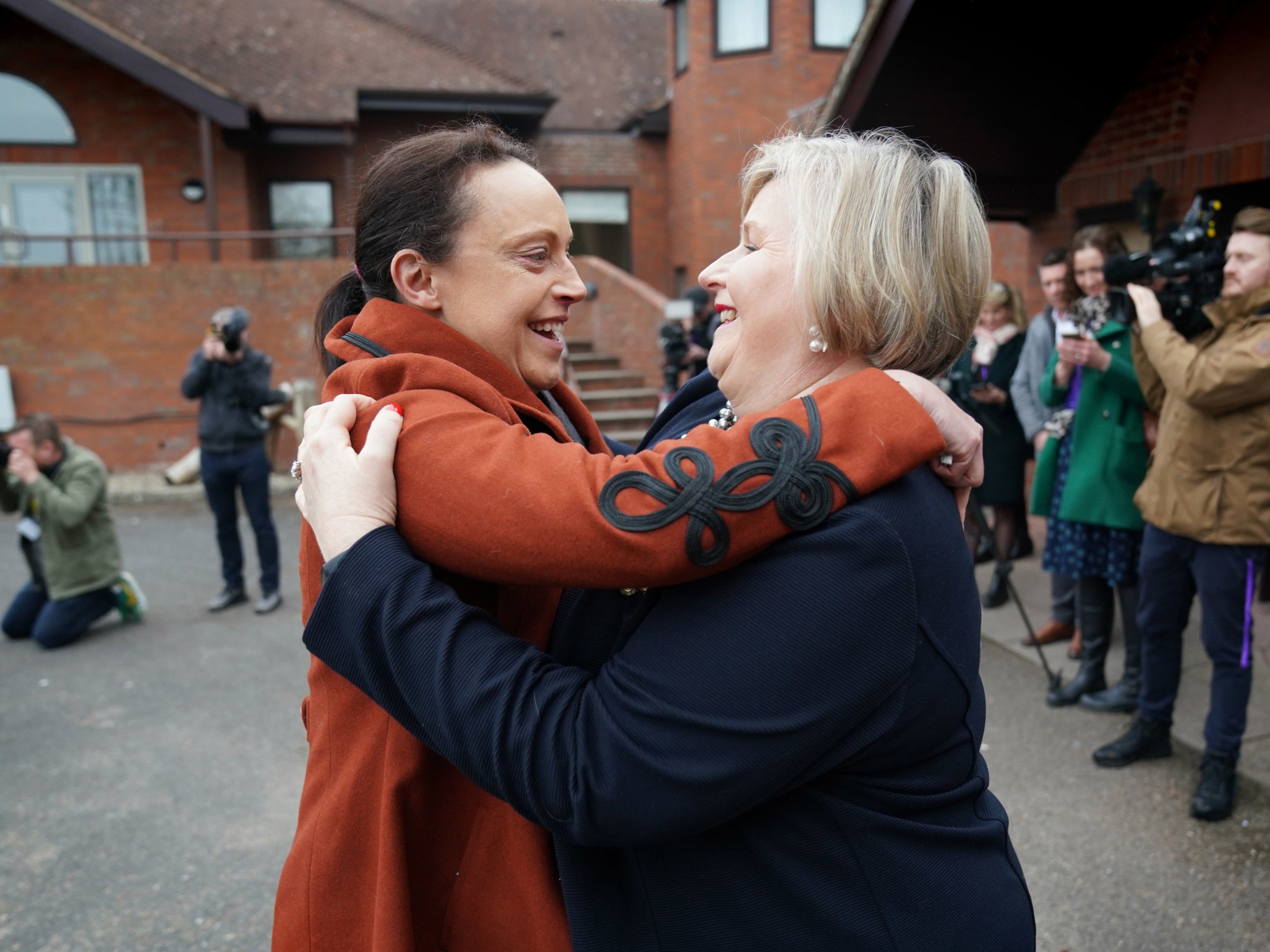 Rhiannon Davies embraces Donna Ockenden following the release of the report at a hotel in Shropshire