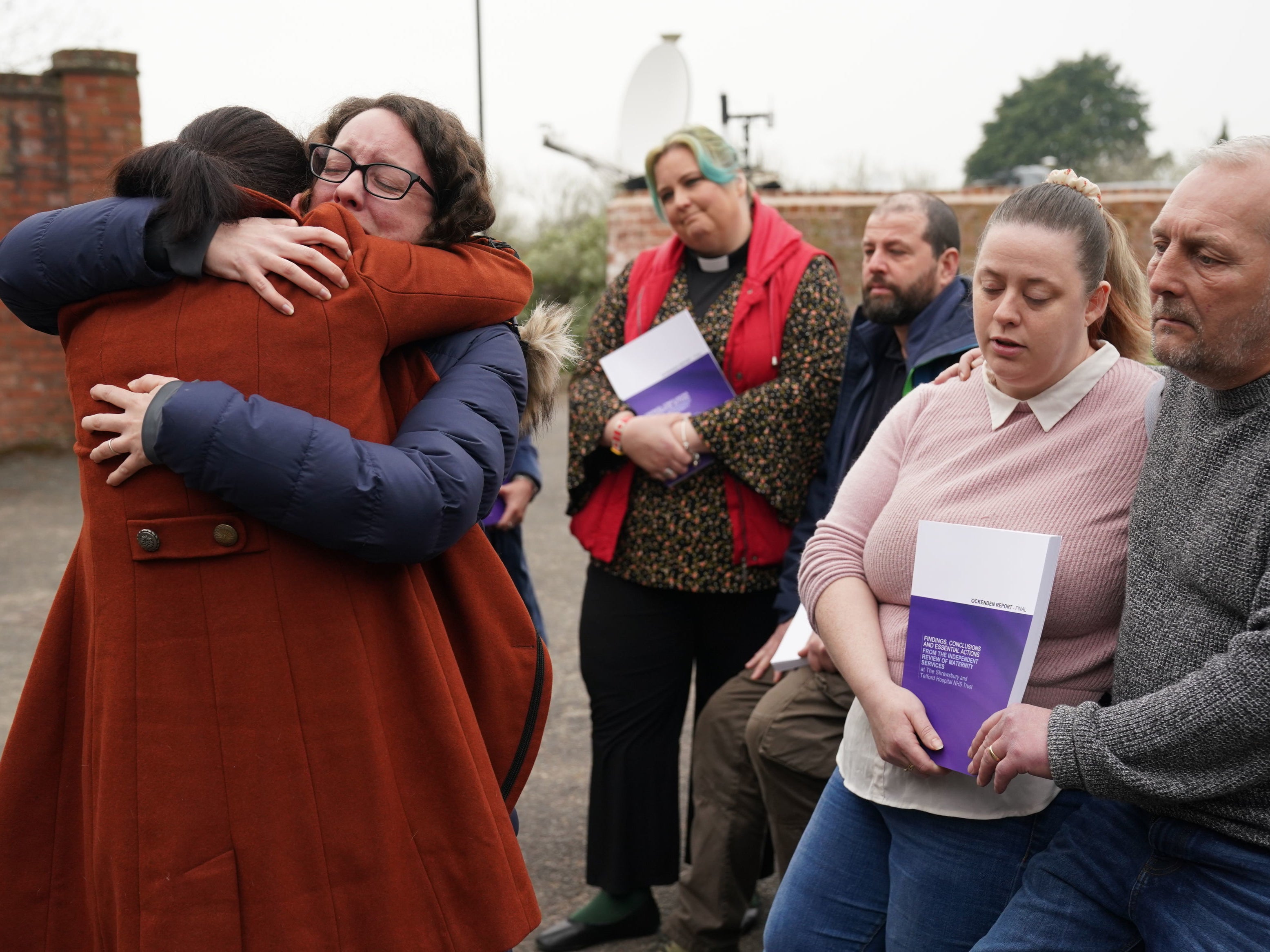 Rhiannon Davies (left) embraces Kayleigh Griffiths, following the release of the final report by Donna Ockenden, chair of the Independent Review into Maternity Services at the Shrewsbury and Telford Hospital NHS Trust, at The Mercure Shrewsbury Albrighton Hotel, Shropshire