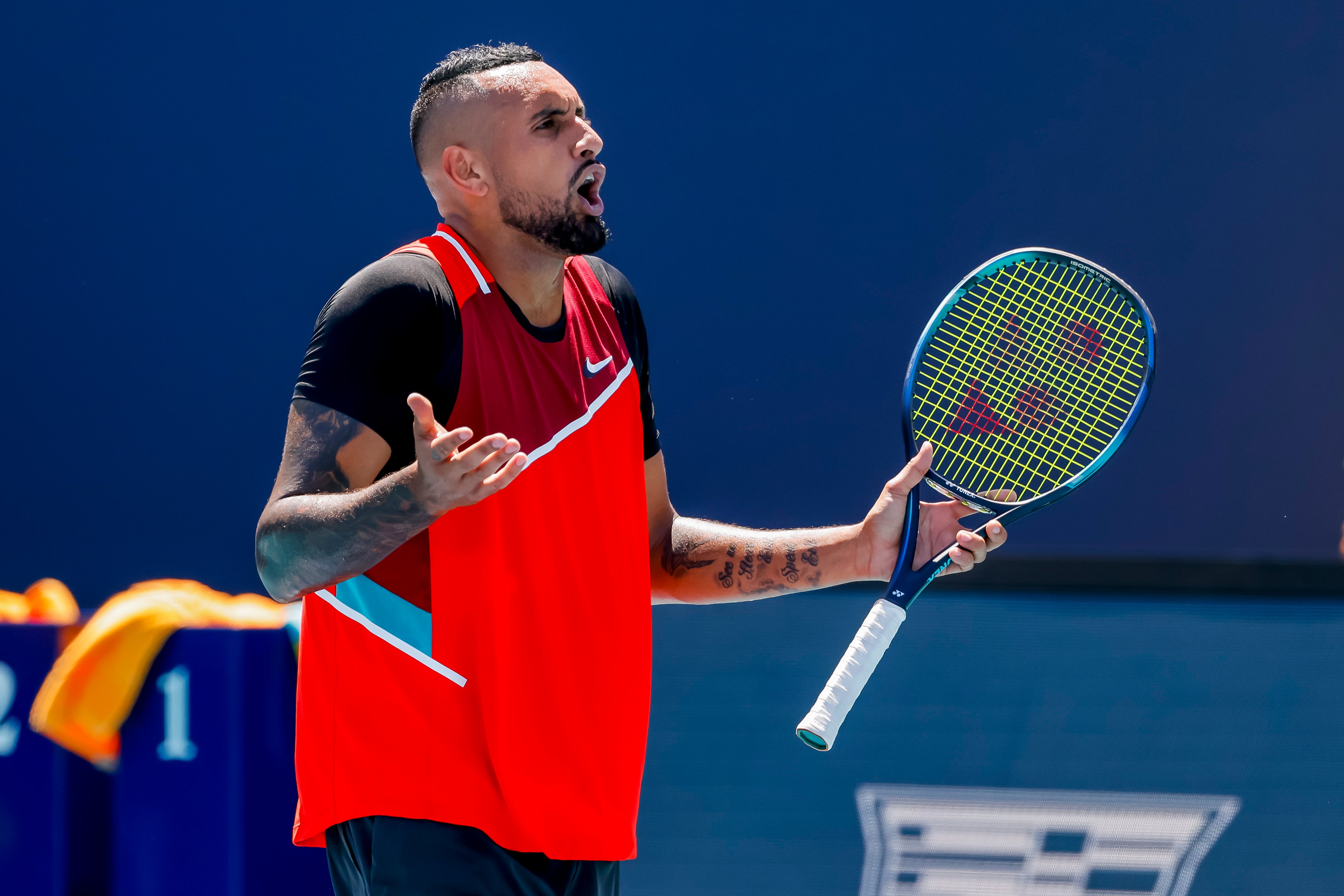 Nick Kyrgios argues with chair umpire Carlos Bernardes