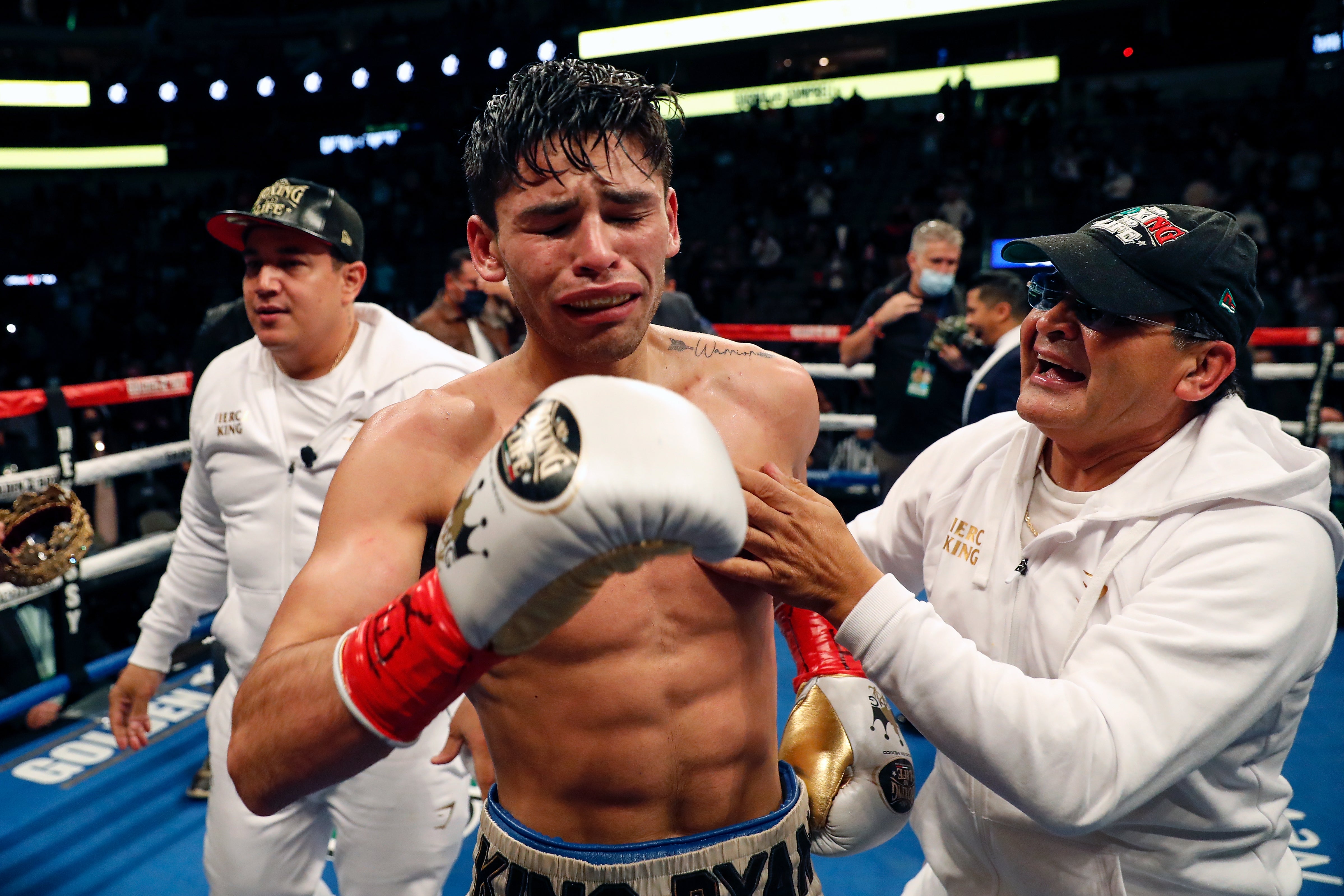 Ryan Garcia reacts after knocking out Luke Campbell