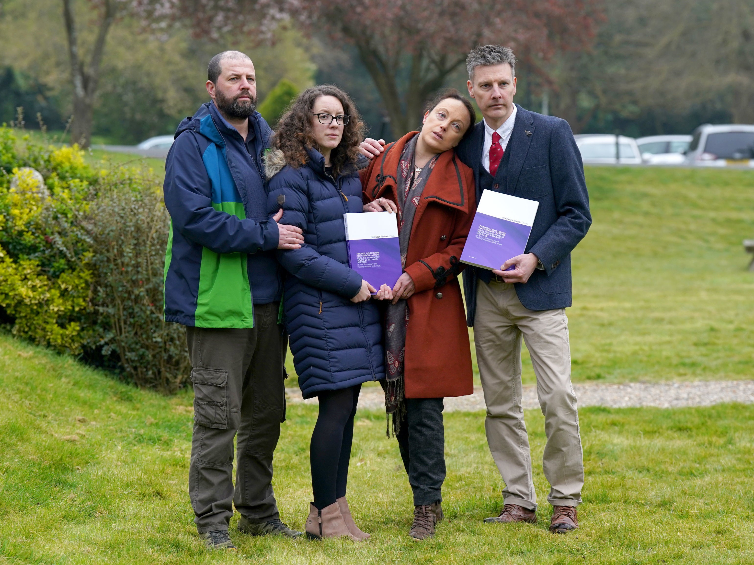 (left to right) Colin and Kayleigh Griffiths, Rhiannon Davies and Richard Stanton with a copy of the Donna Ockenden Independent Review into Maternity Services at the Shrewsbury and Telford Hospital NHS Trust