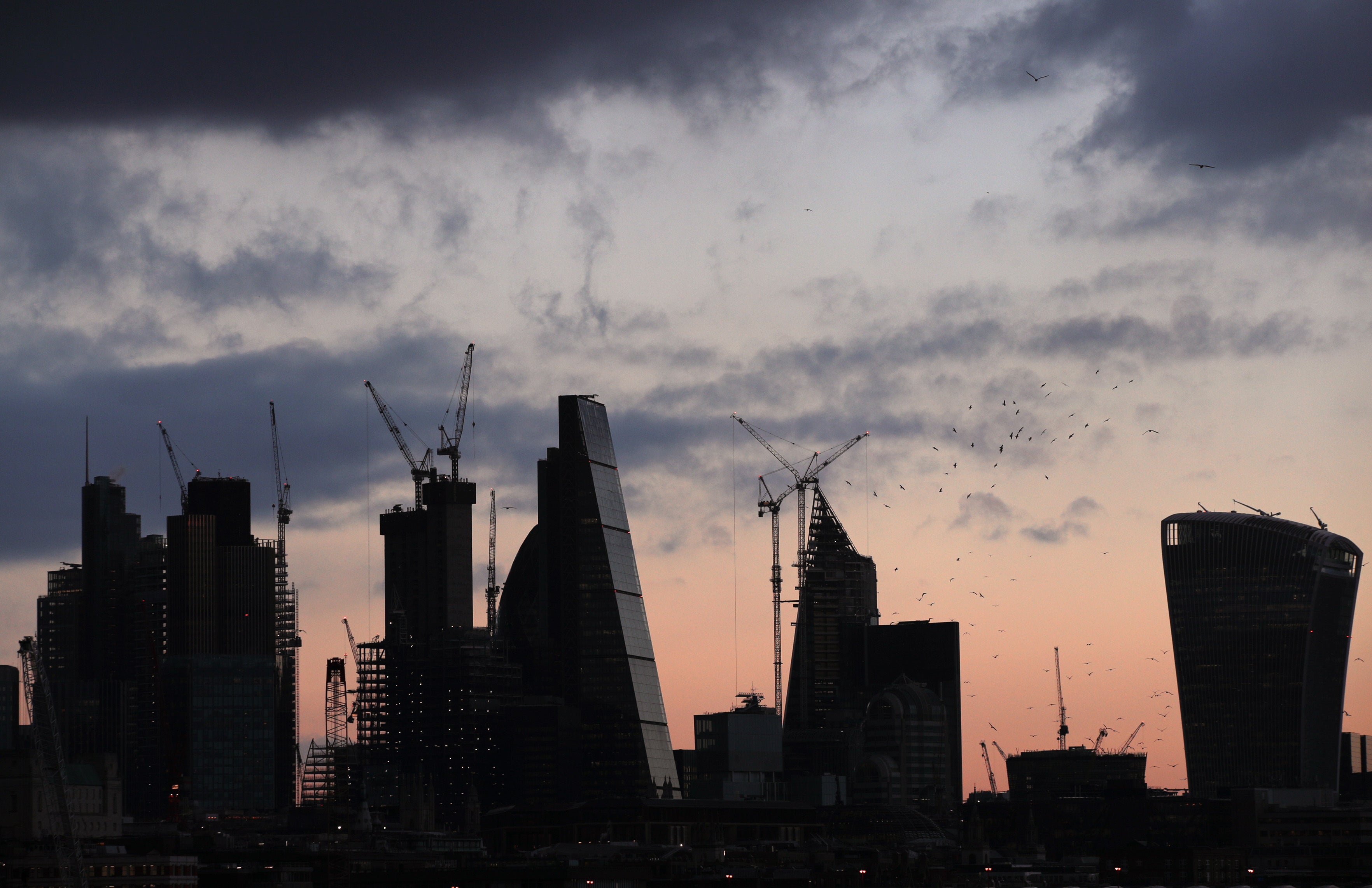 A view of the City of London skyline before sunset. London stocks finished higher on Wednesday (Yui Mok/PA)