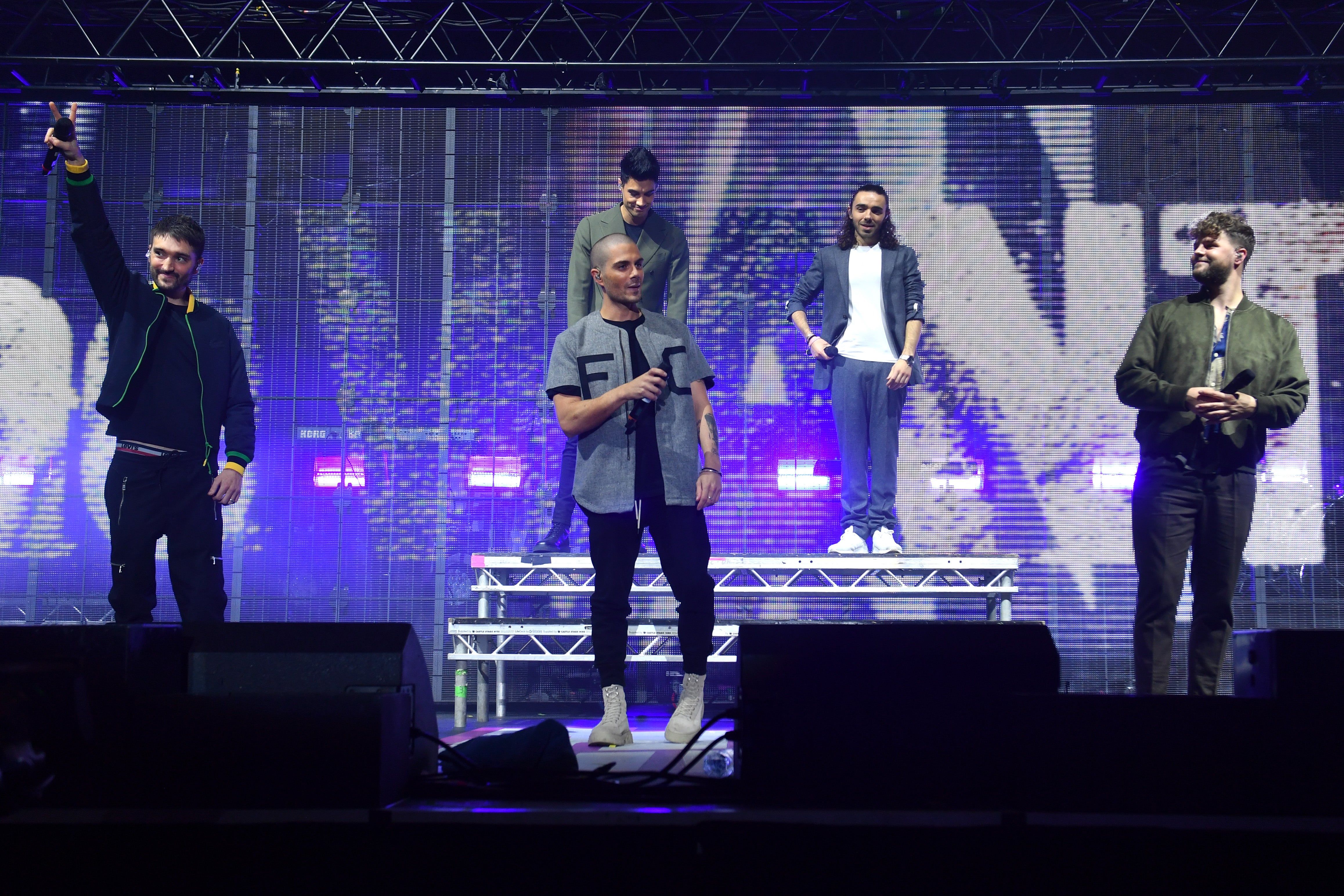 Parker (far left) on stage with The Wanted in November