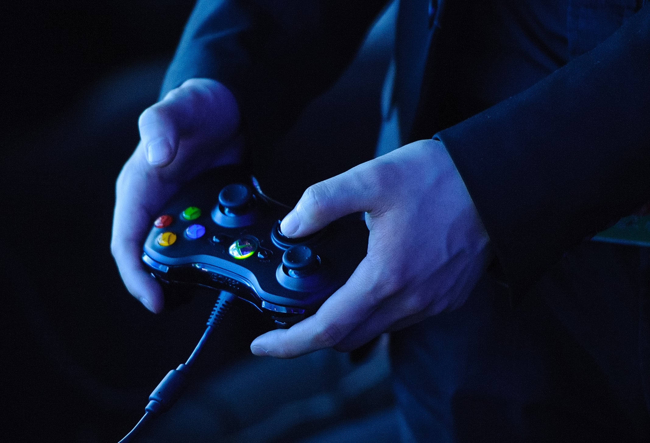 A man holds an Xbox 360 controller at a preview event for Star Trek: the Video Game, at the Science Museum, in central Lodnon.