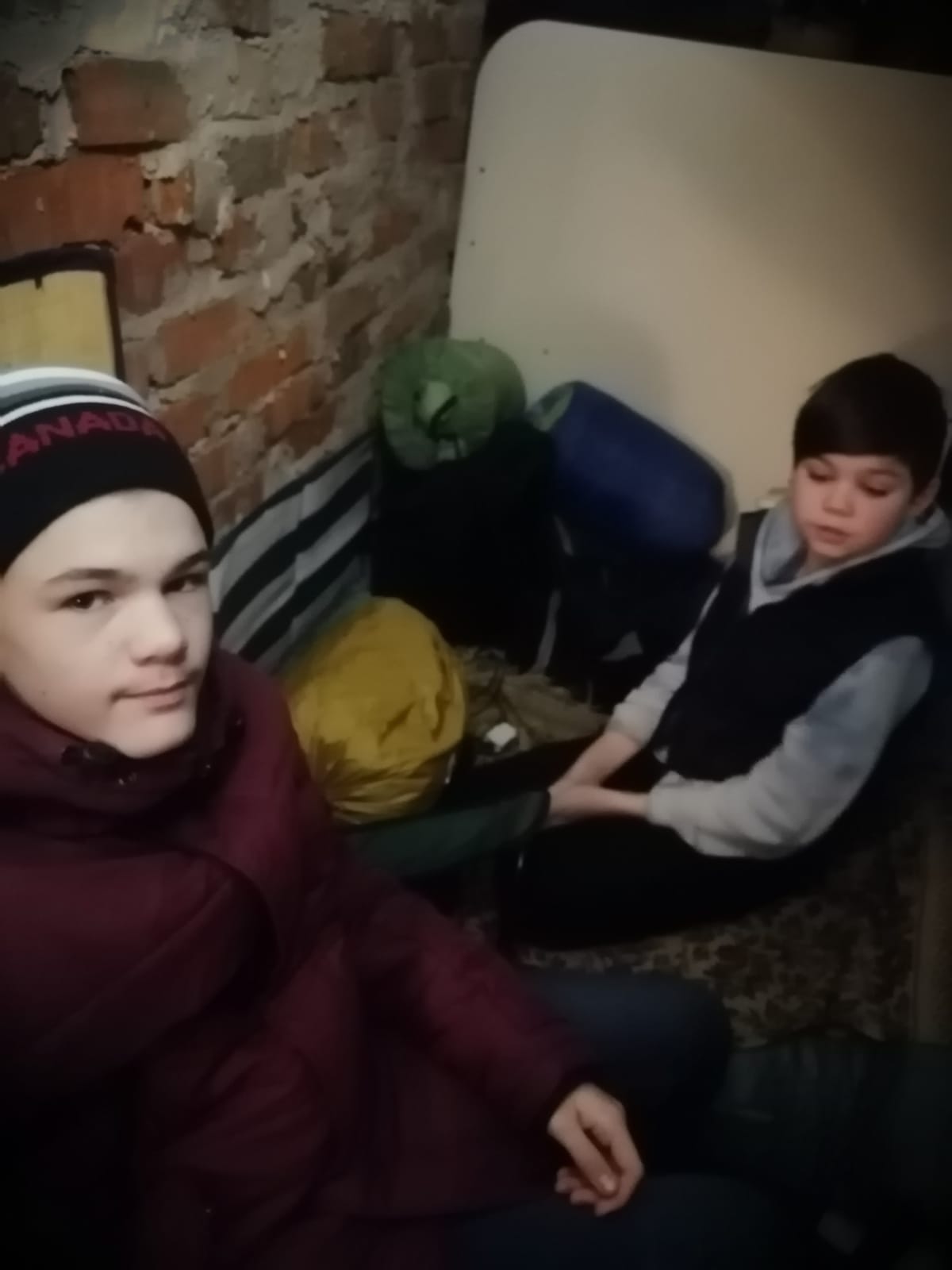 Yulia Zhdanova’s sons Ilya and Stefan in the basement of their home in Chernihiv