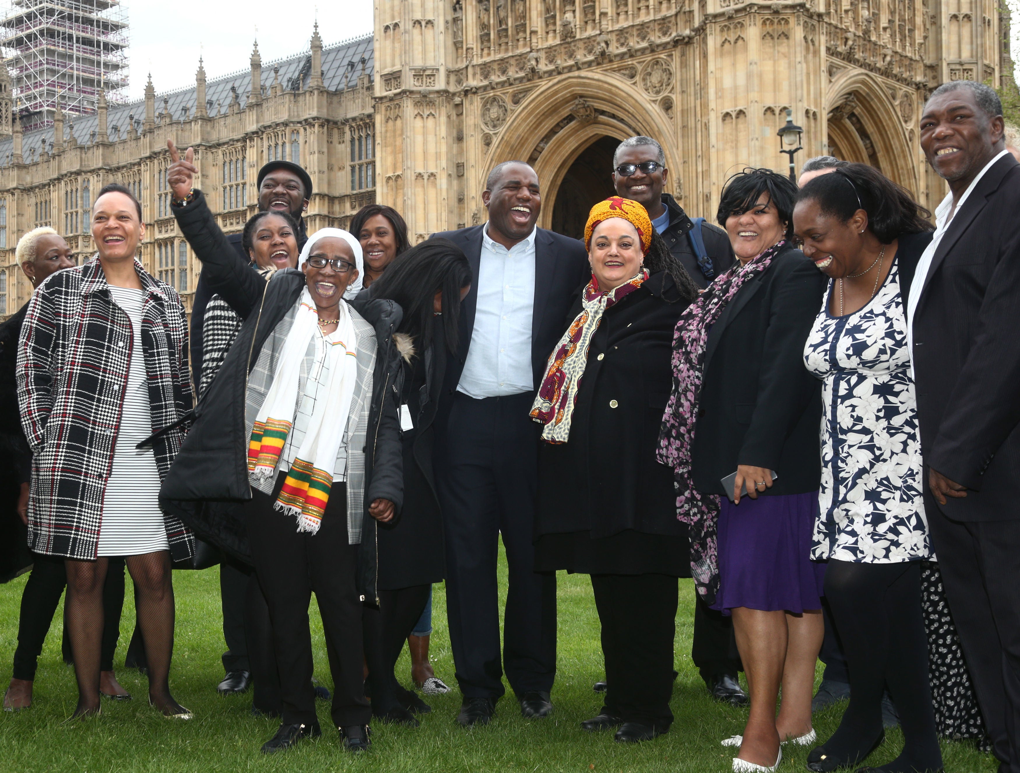 MP David Lammy is flanked by people affected by the Windrush scandal including Paulette Wilson and Sarah O’Connor, who both died suddenly after being wrongly stripped of their rights to live in the UK