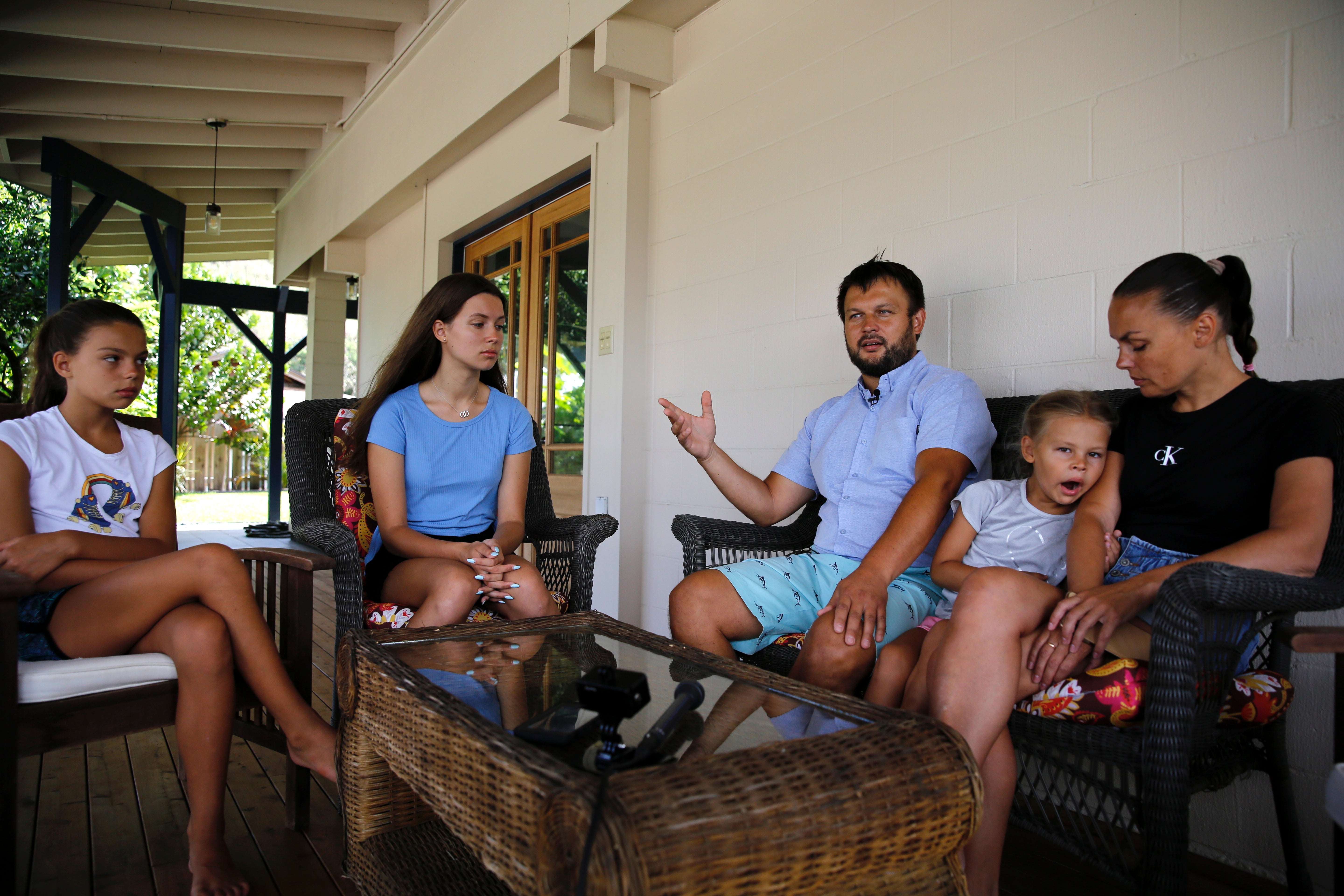 Vasyl and Marina Prishchak and their three daughters at their temporary home in Hawaii