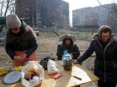 Russian forces accused of blocking Mariupol evacuation buses and ‘seizing humanitarian aid’