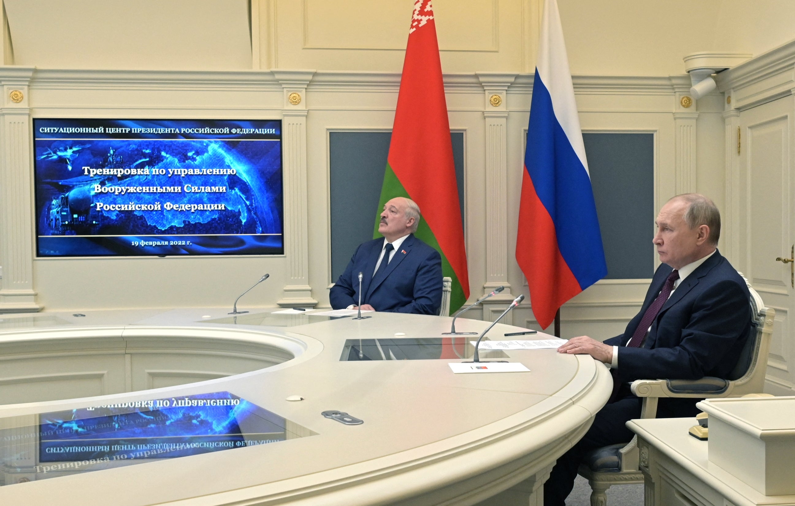 Mr Putin and Mr Lukashenko watch training launches of ballistic missiles from the situational centre of the Russian defence ministry in Moscow