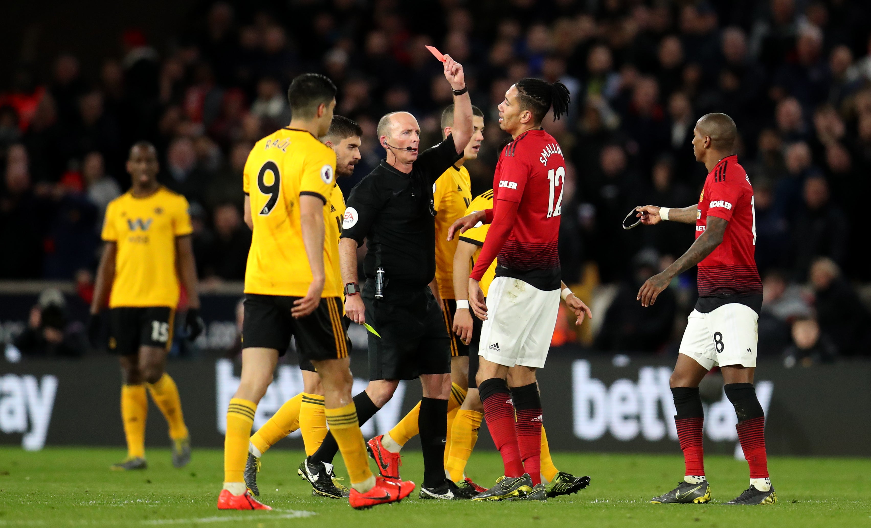 Mike Dean has shown more red cards than any other Premier League referee (PA)