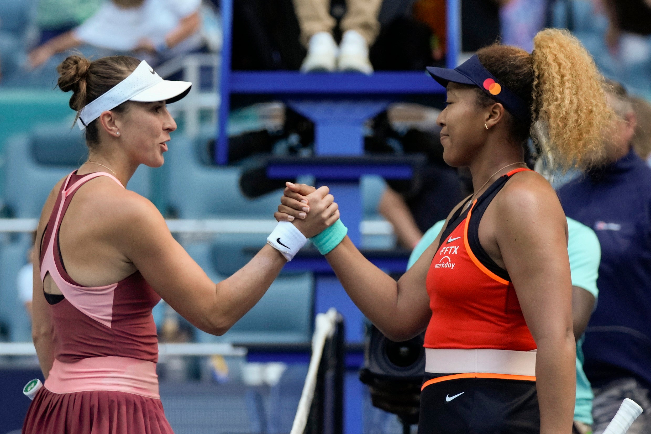 Naomi Osaka, right, claimed an emotional win over Belinda Bencic (Rebecca Blackwell/AP)