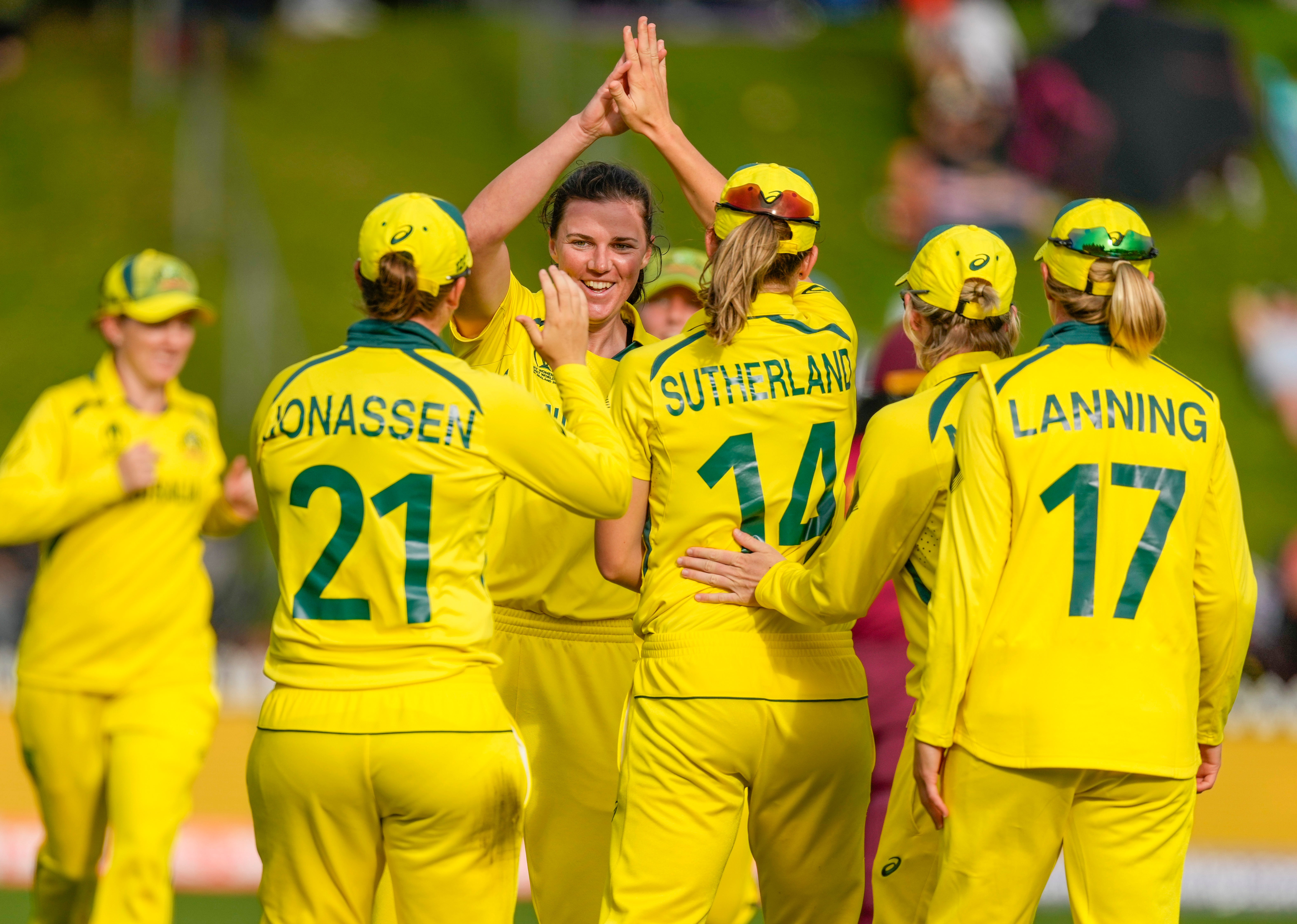 Tahlia Mcgrath, centre, of Australia celebrates with teammates in the semi-final against the West Indies