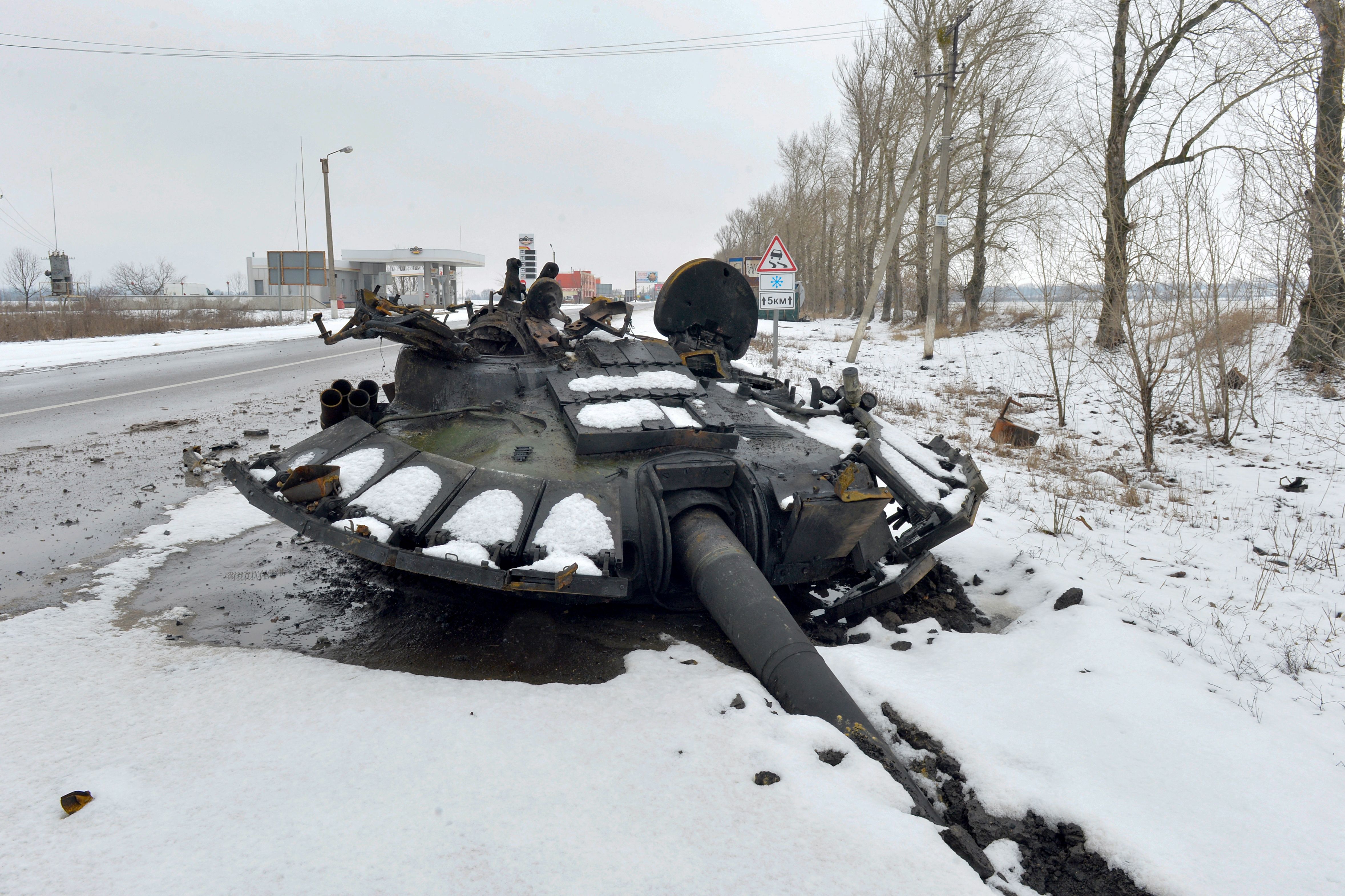 Part of a destroyed Russian tank on the roadside on the outskirts of Kharkiv