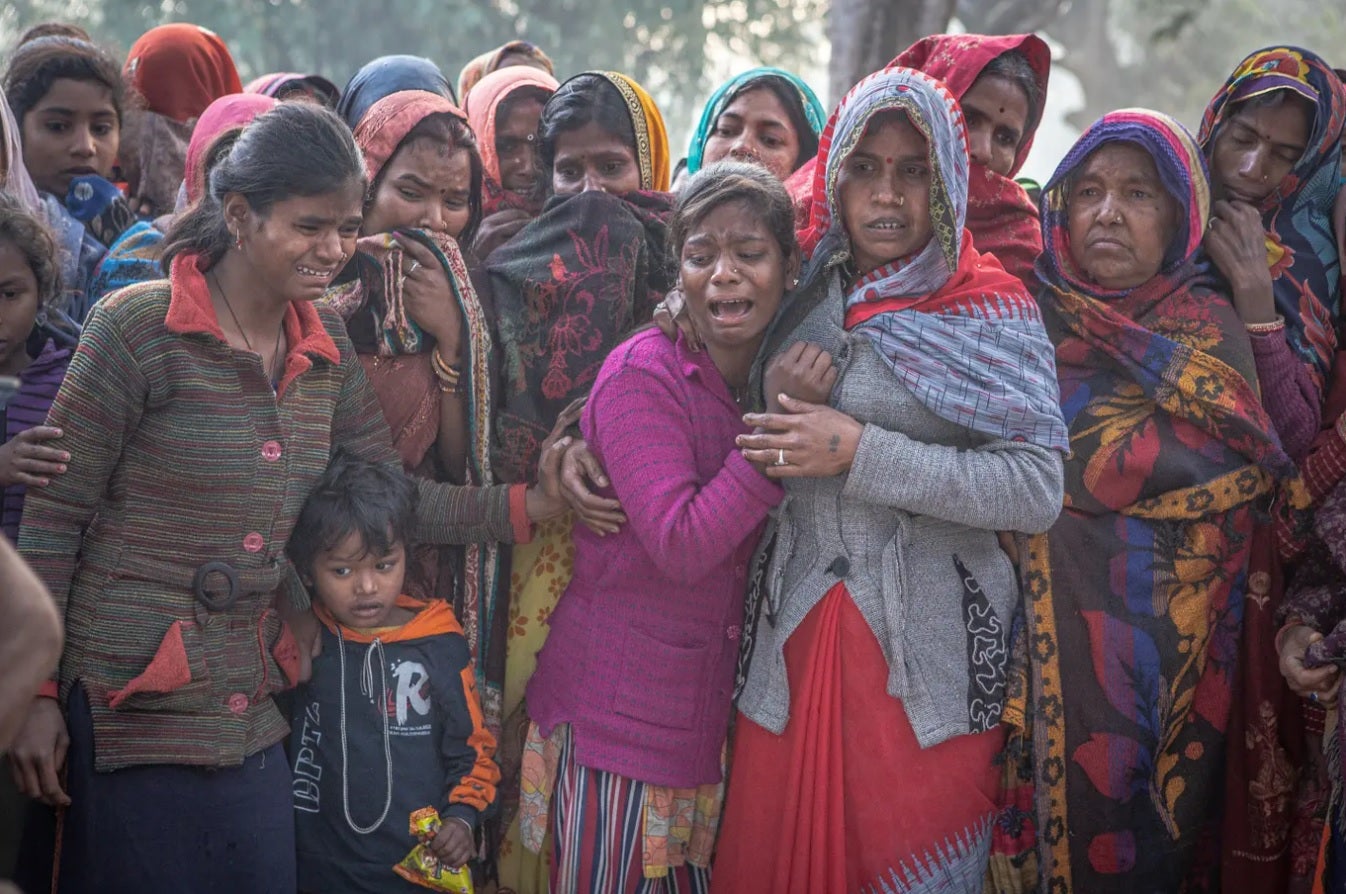 Family members mourn Kripal Mandal, a Nepali migrant worker who died at the age of 39 from acute respiratory failure in Qatar in February. Human rights groups accused employers in the Gulf emirate of serious exploitation of migrant workers