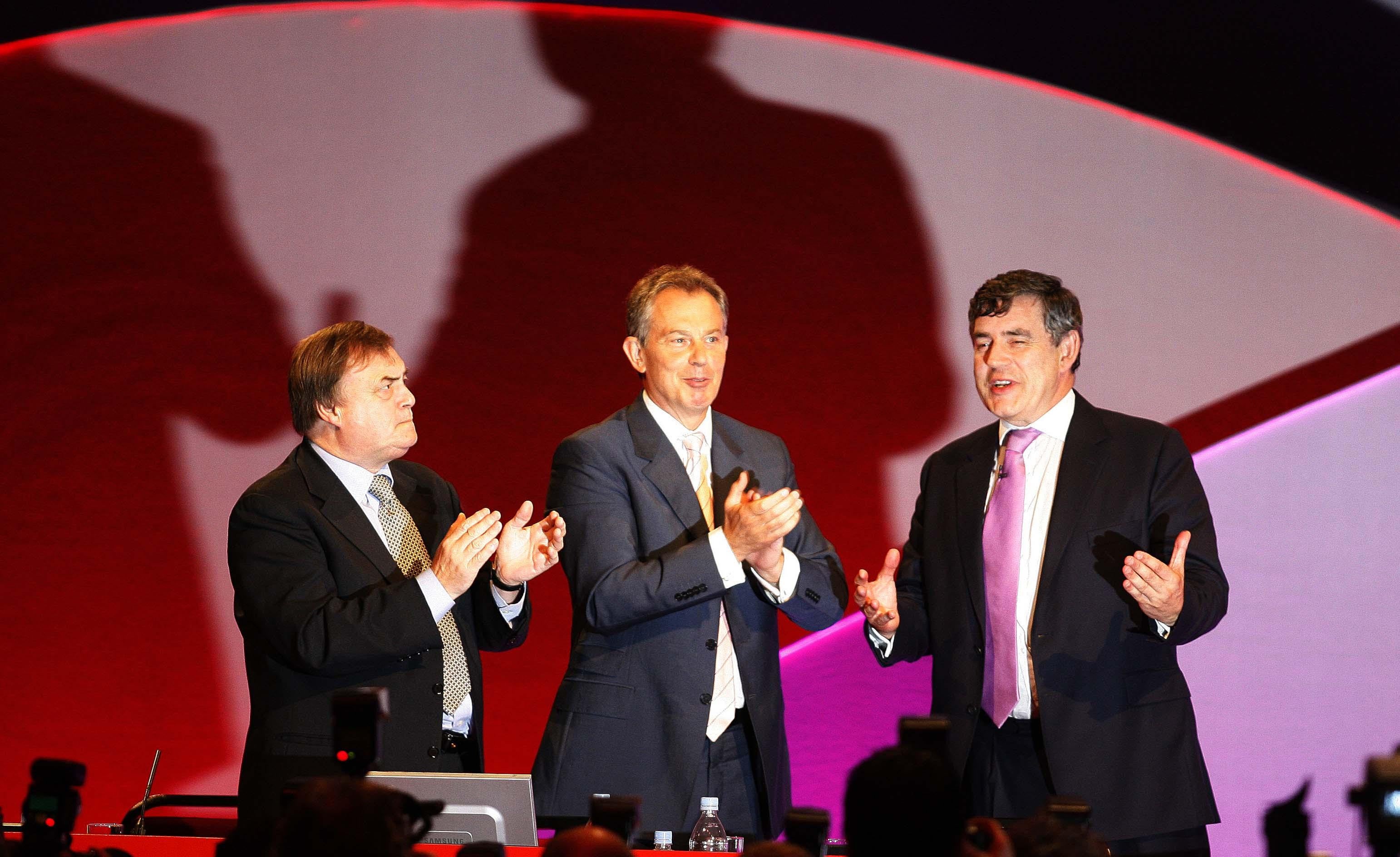 Tony Blair and deputy PM John Prescott congratulate chancellor Gordon Brown after his speech to the 2006 Labour Party conference in Manchester