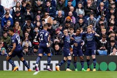 Man City see off Burnley to maintain top spot in Premier League