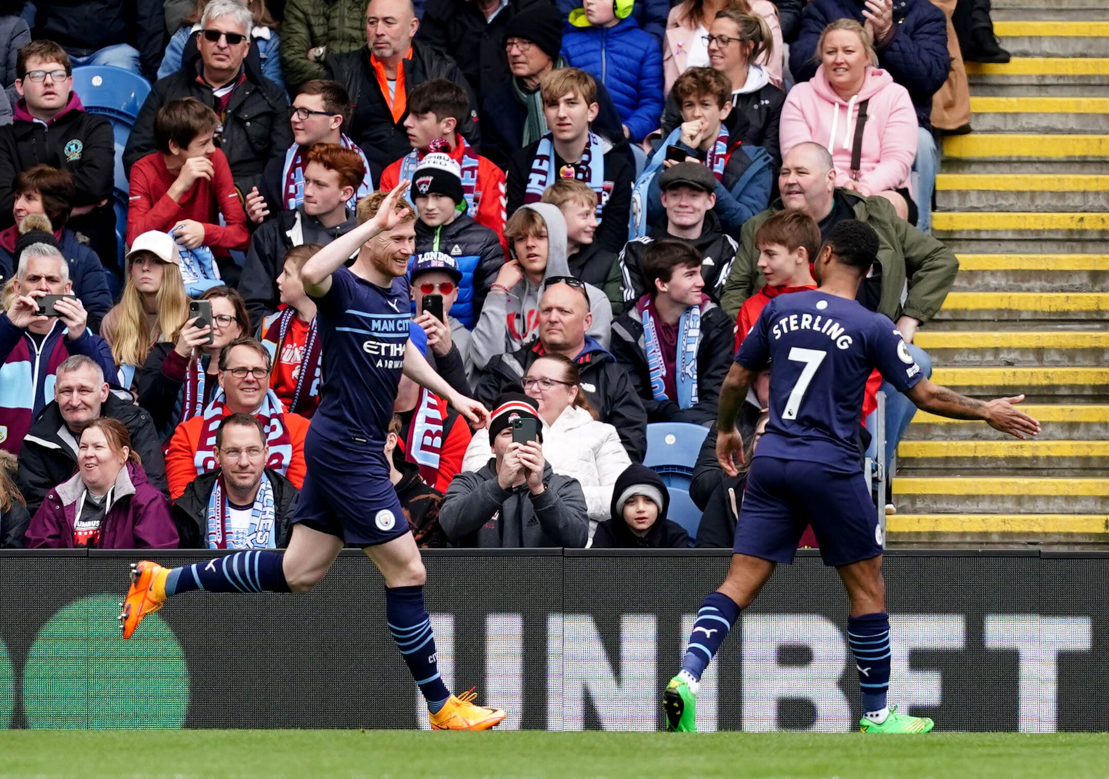 Kevin De Bruyne celebrates with Raheem Sterling following his strike at Burnley