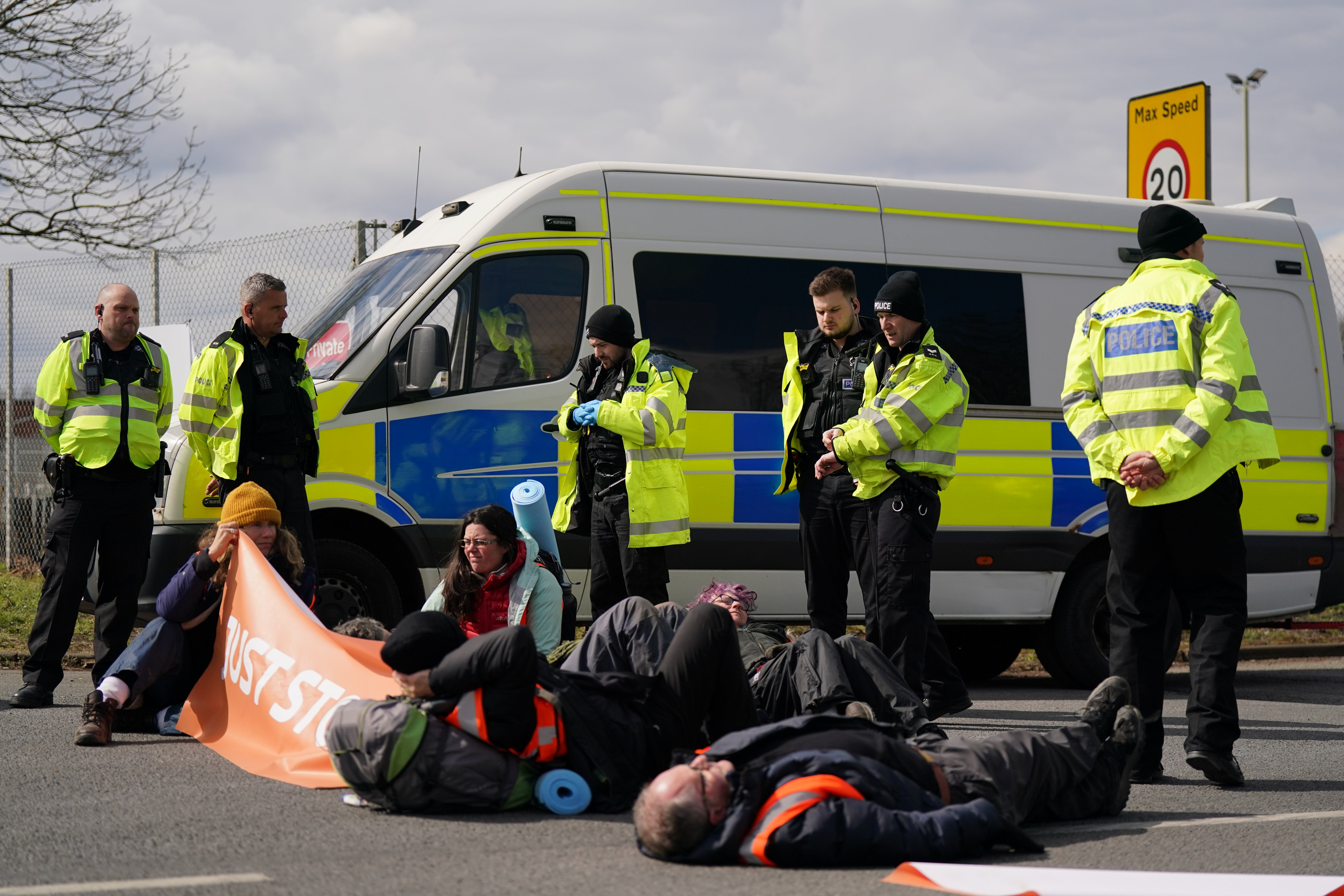 Activists from Just Stop Oil take part in a blockade at the Kingsbury Oil Terminal in Warwickshire on Sunday (Jacob King/PA)