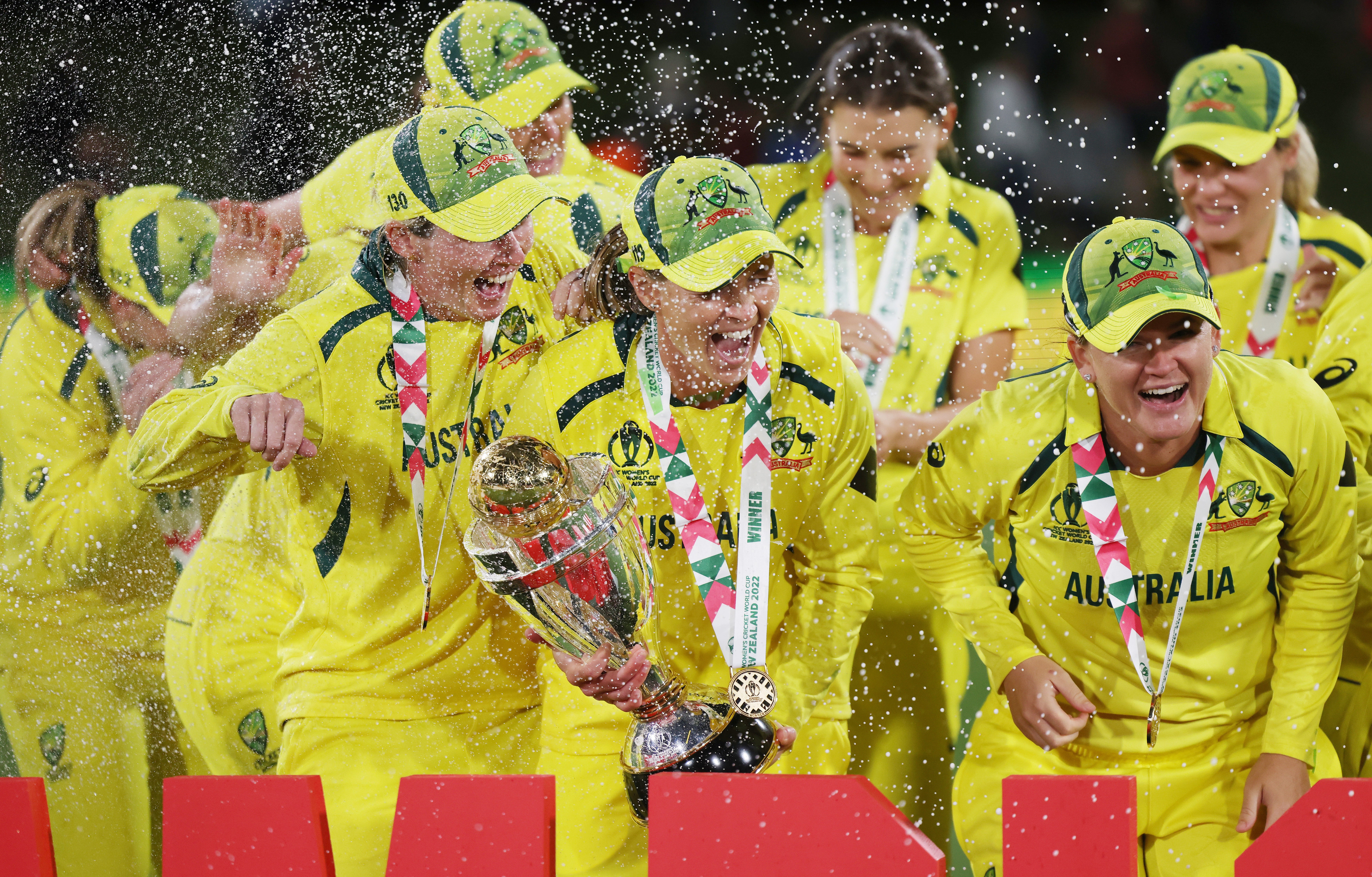 Meg Lanning celebrates with her Australian teammates after victory over England