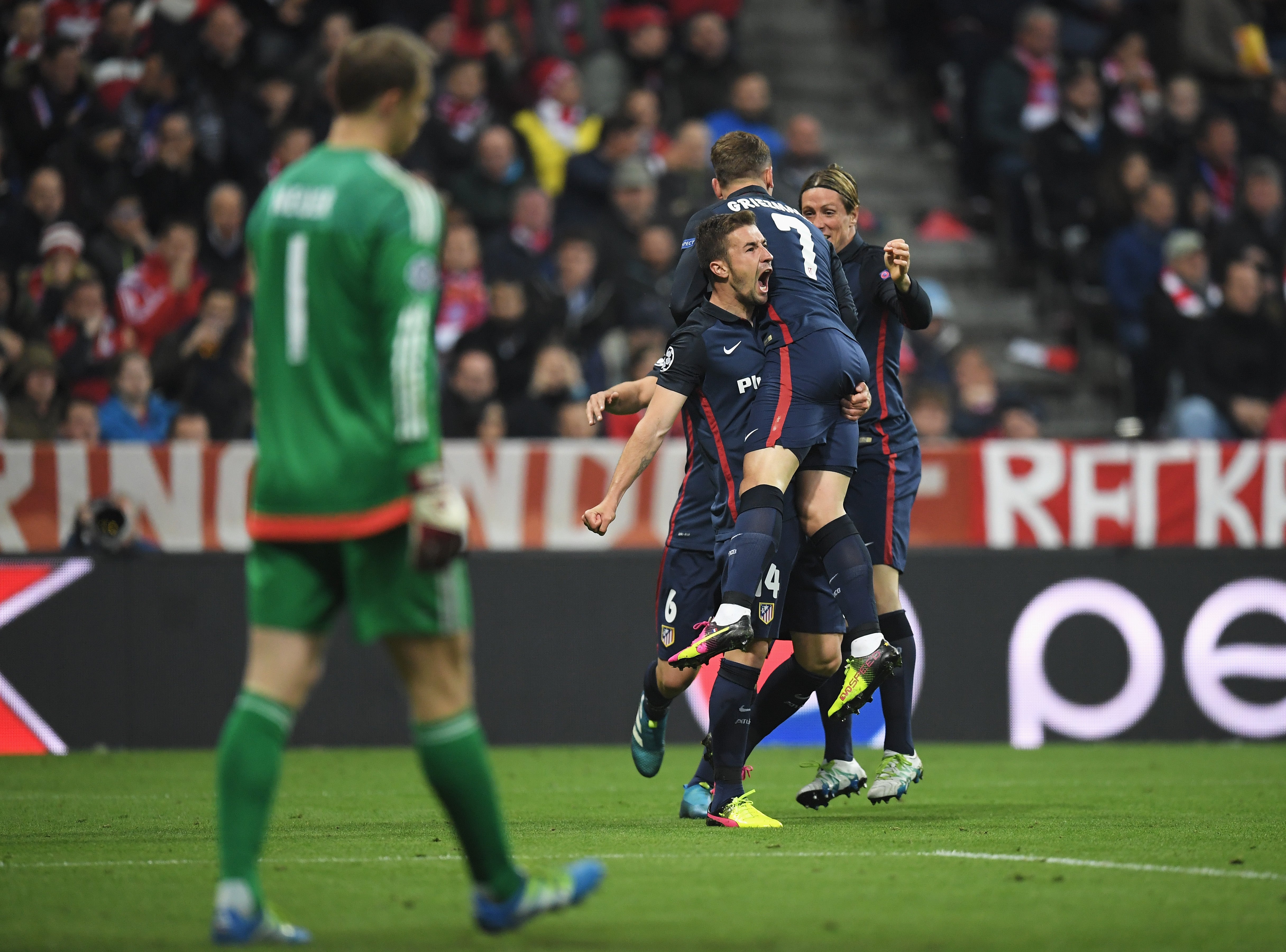 Atletico players celebrate their away goal