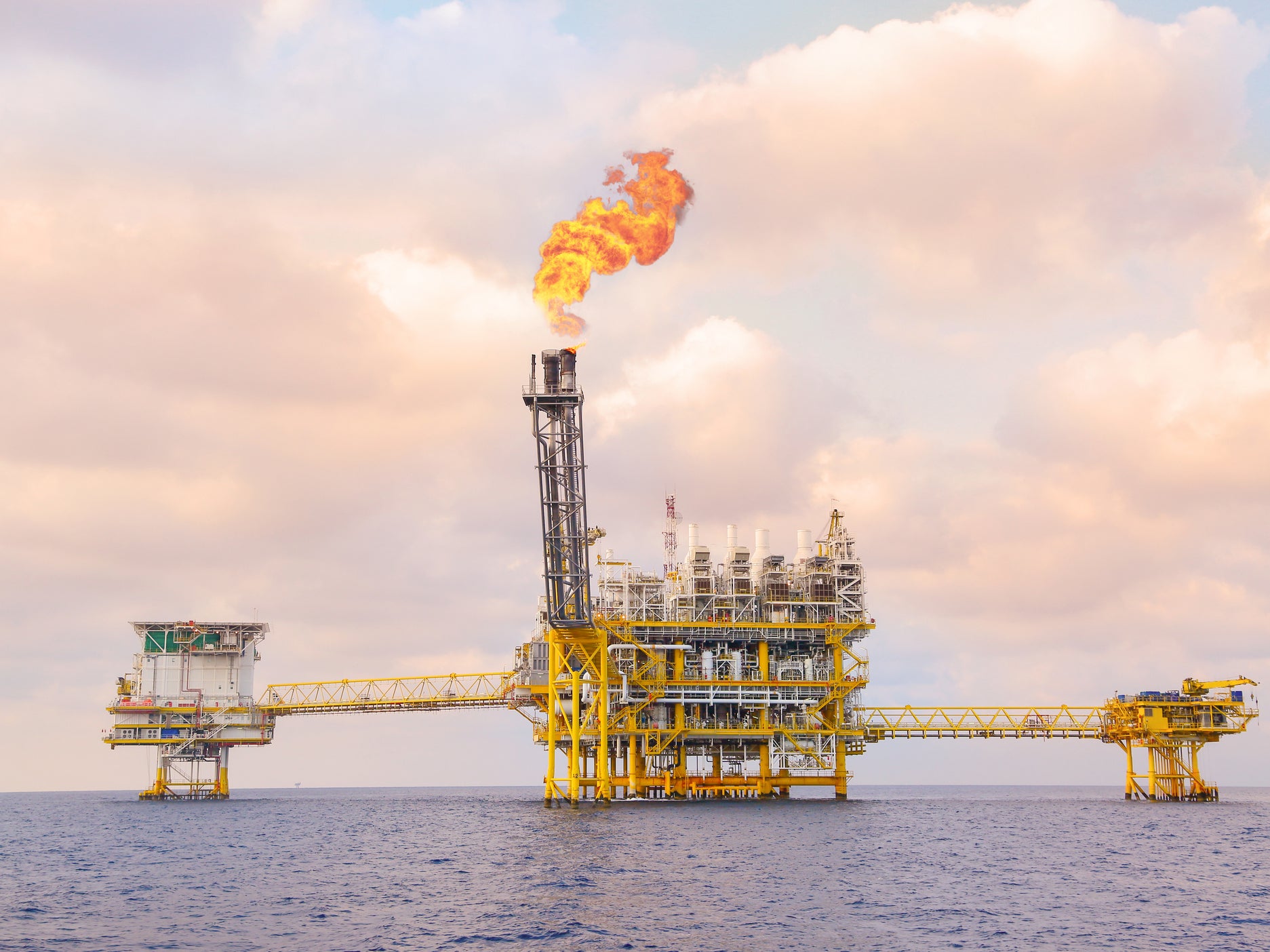 Flaring excess gases from a deep sea drilling platform for oil and gas. Greenhouse gas emissions are still increasing ‘across all sectors globally'