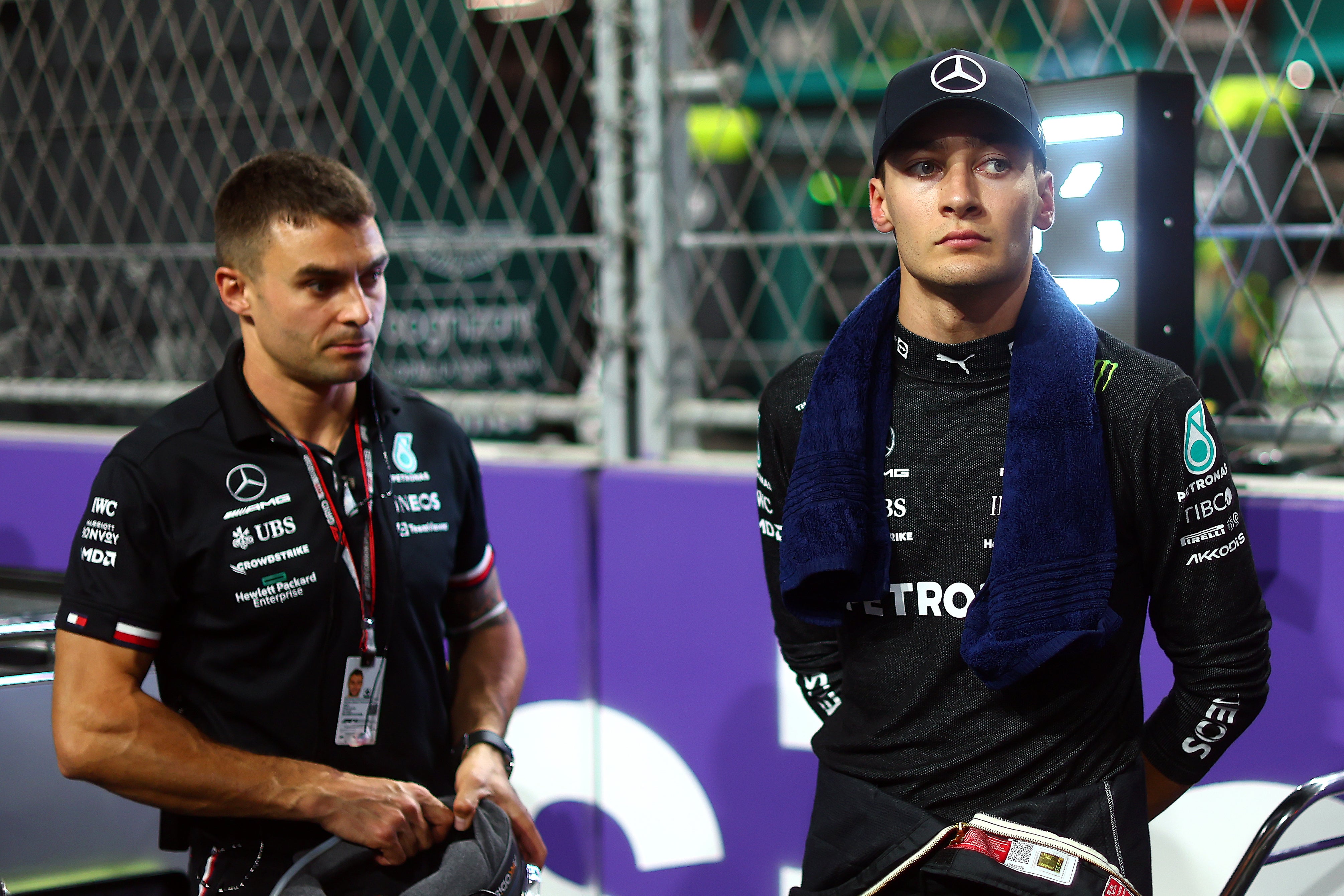 George Russell of Great Britain and Mercedes looks on