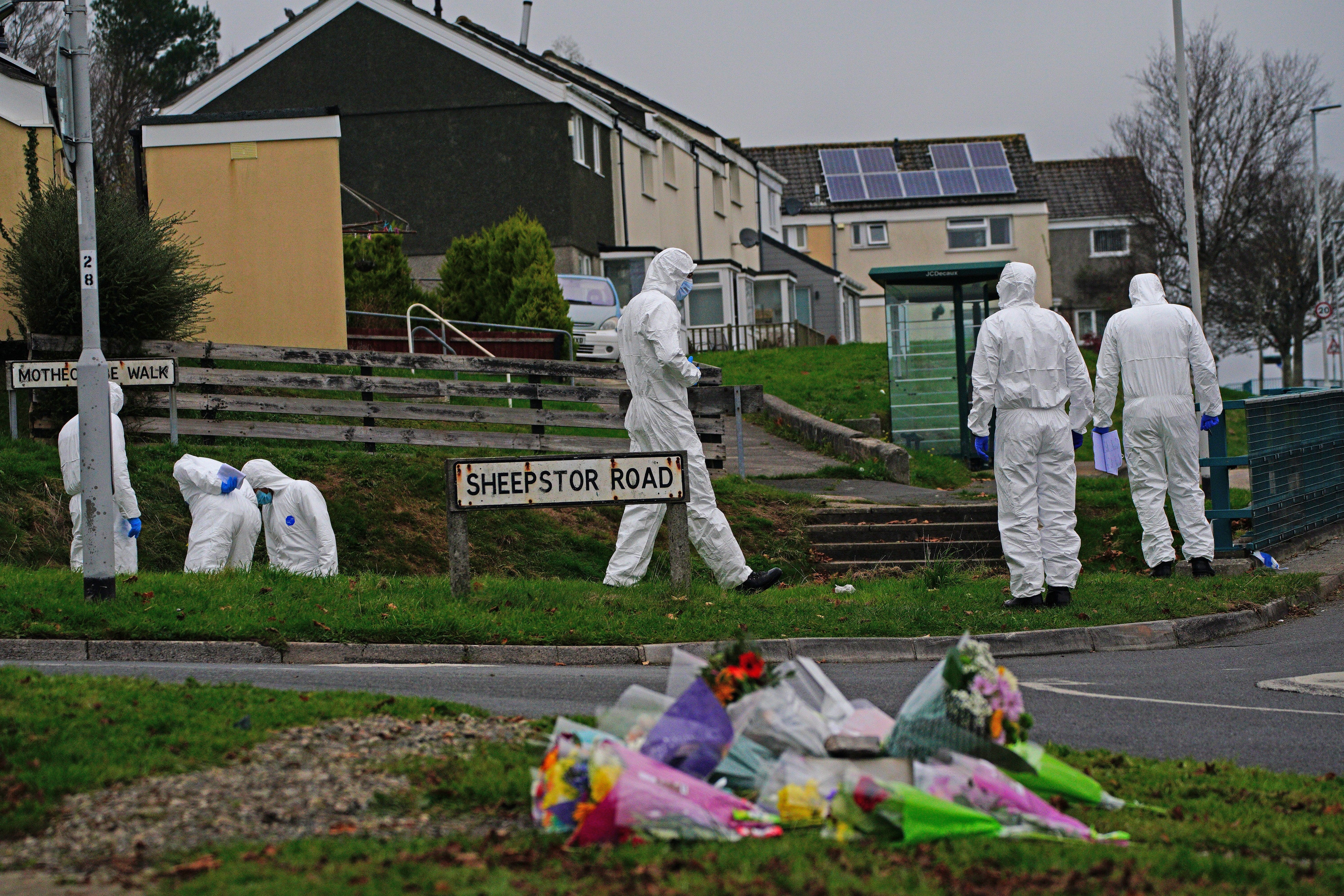 Crime scene investigators on Sheepstor Road in Plymouth near the bus stop where Bobbi-Anne McLeod disappeared