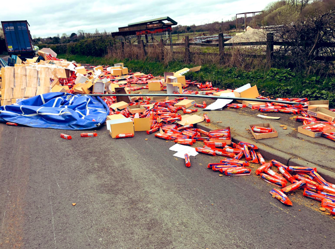 Hundreds of toppled biscuit packets on the roadside in Sandiacre (Derbyshire Constabulary)