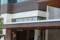 Police: Man shot after running over worker, stabbing another