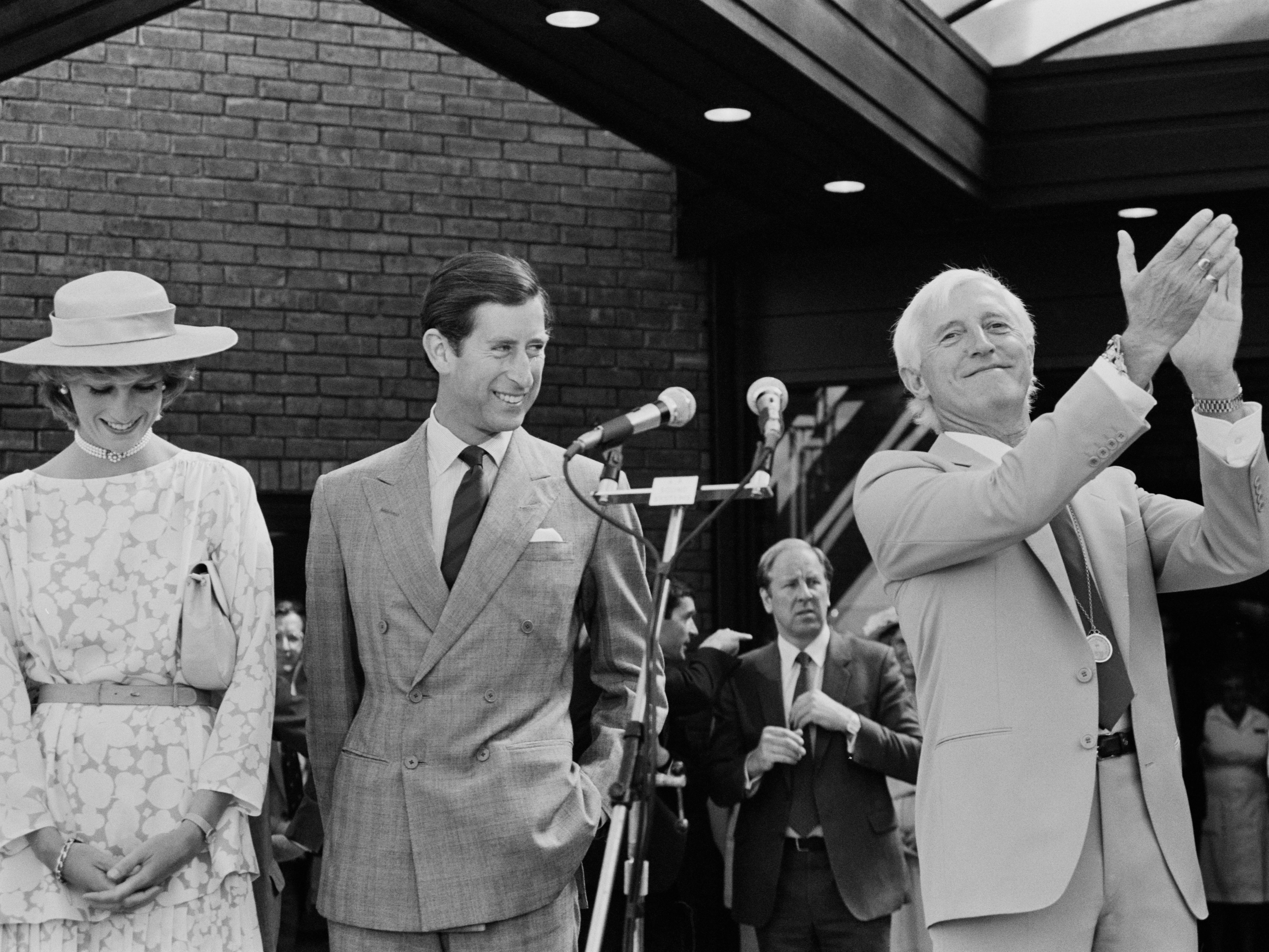 Prince Charles, Princess Diana and Jimmy Savile in 1983