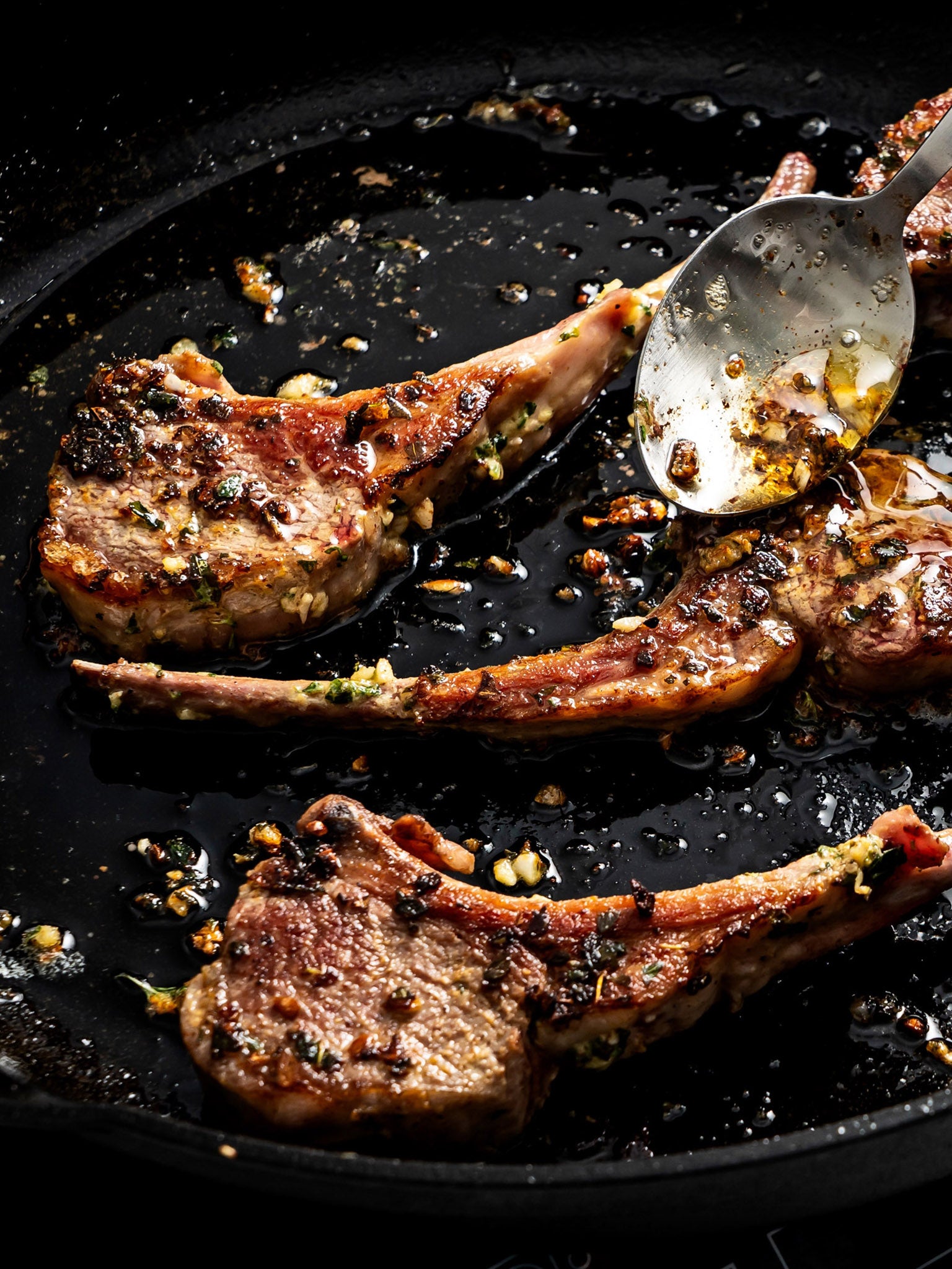 Marinated chops are pan-fried and basted in butter and their own rendered fat