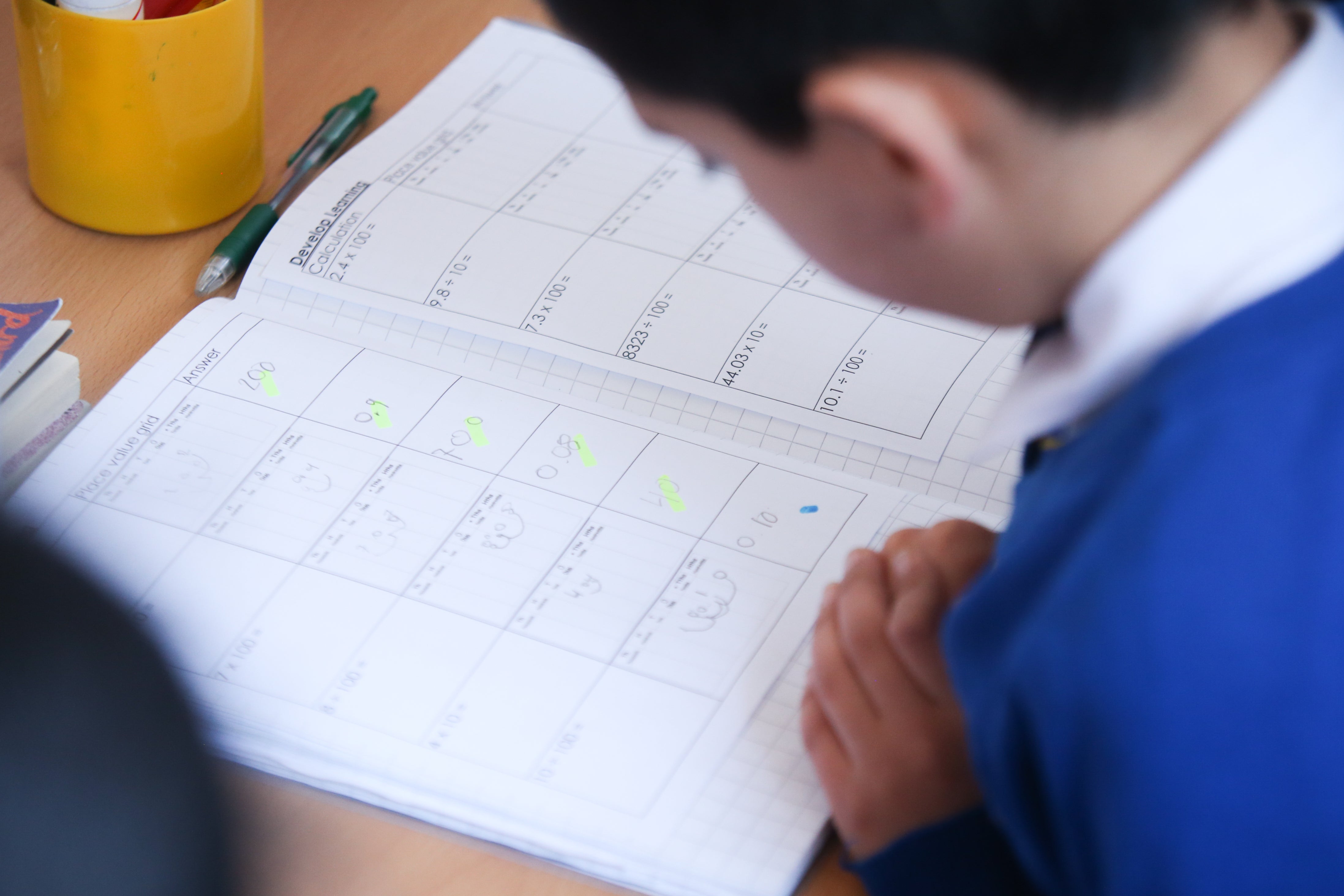 A child reading a schoolbook (James Manning/PA)