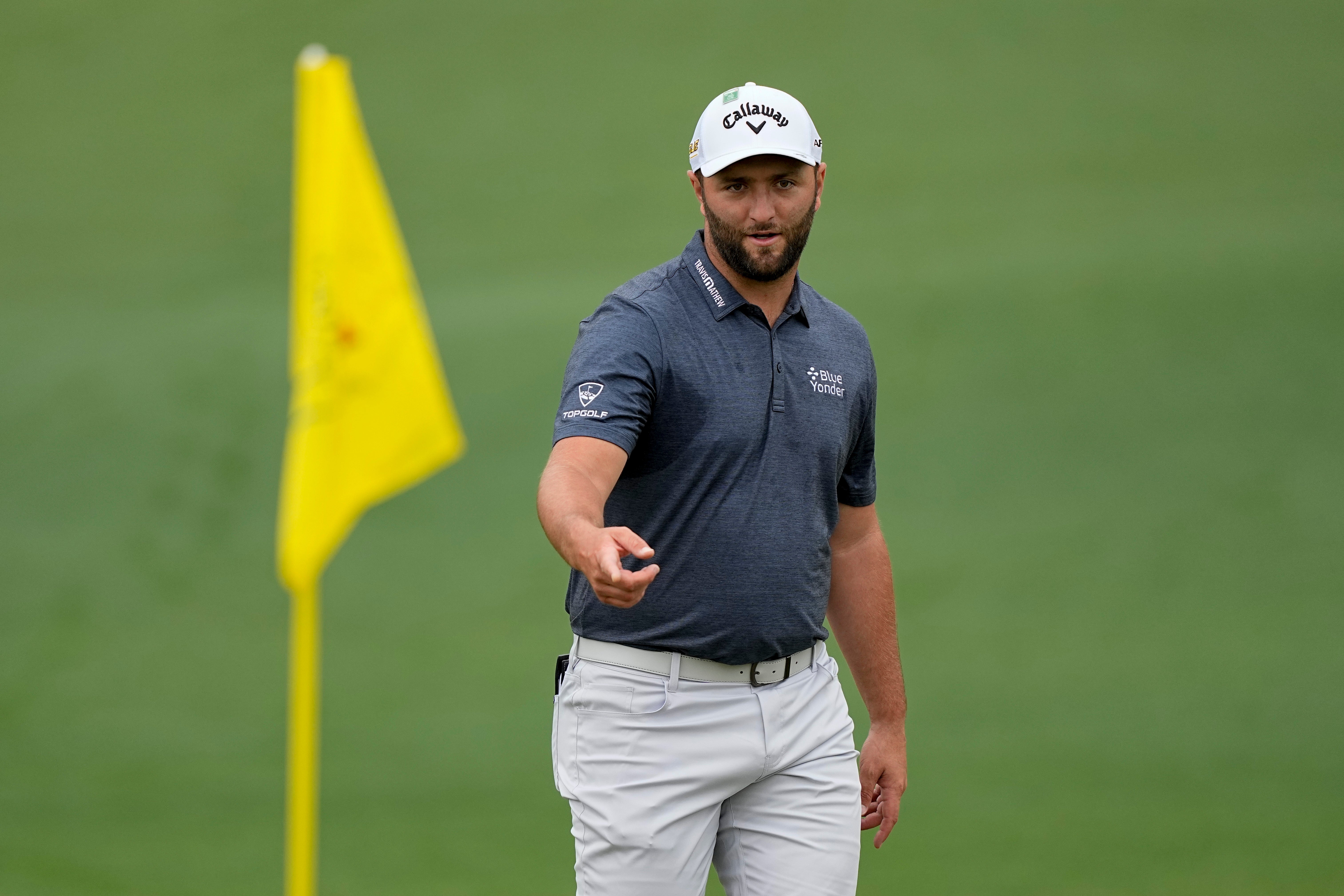 Jon Rahm walks on the second green during a practice round for the Masters (David J. Phillip/AP)