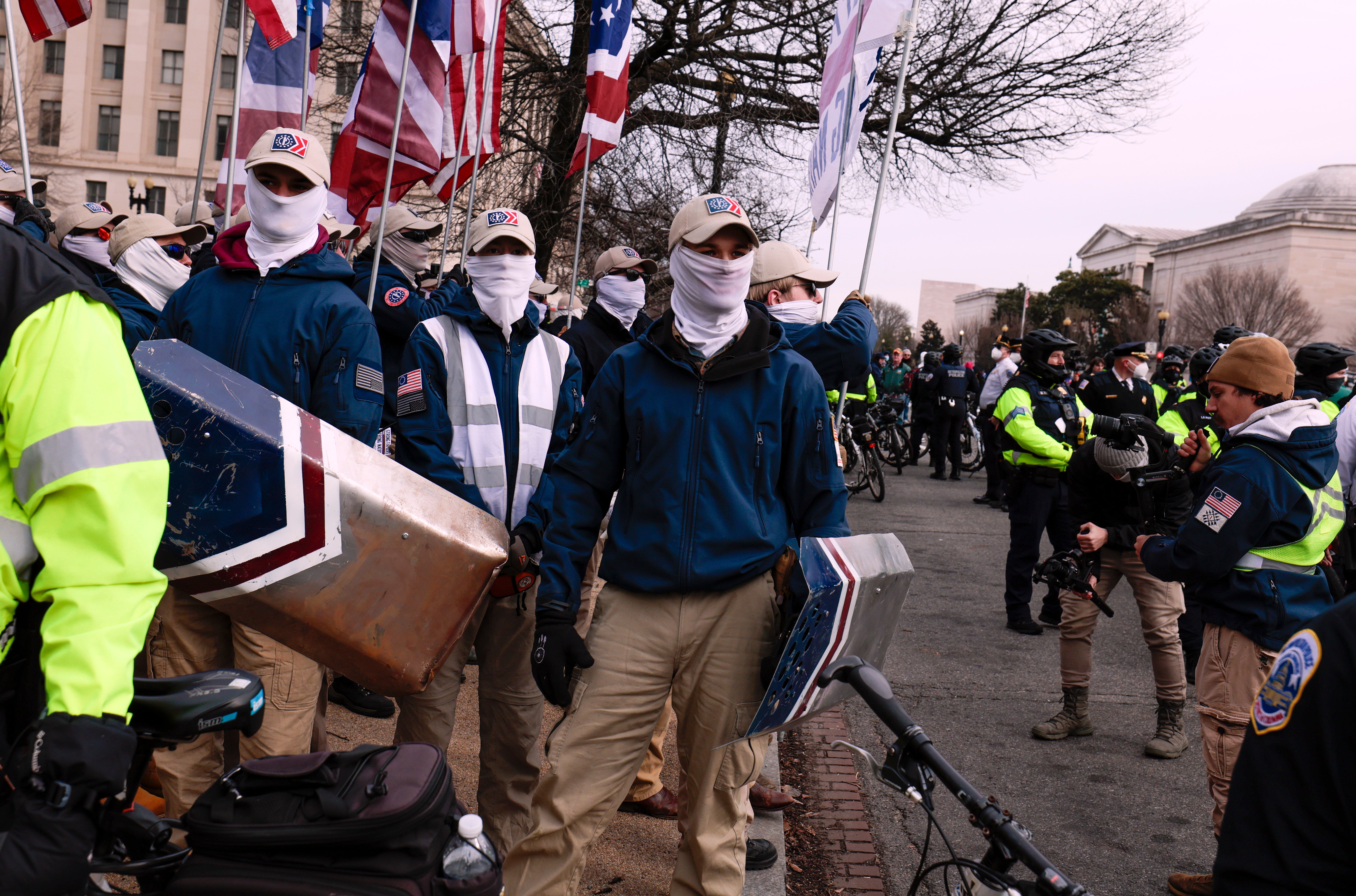 Police officers surround members of the Patriot Front as they march with anti-abortion activists during the 49th annual March for Life rally on January 21, 2022