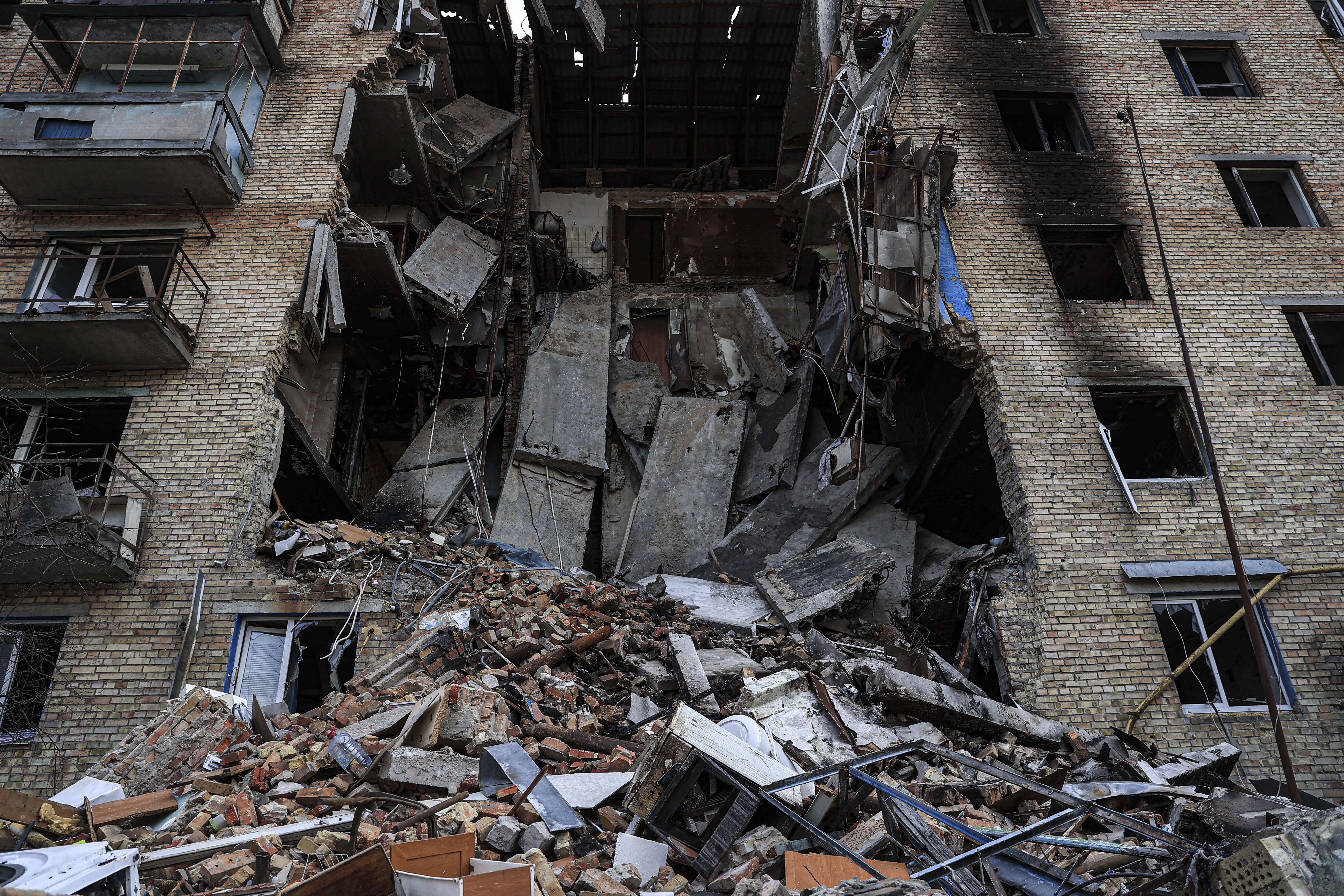 A completely destroyed building is seen after shelling in Horenka district of Bucha