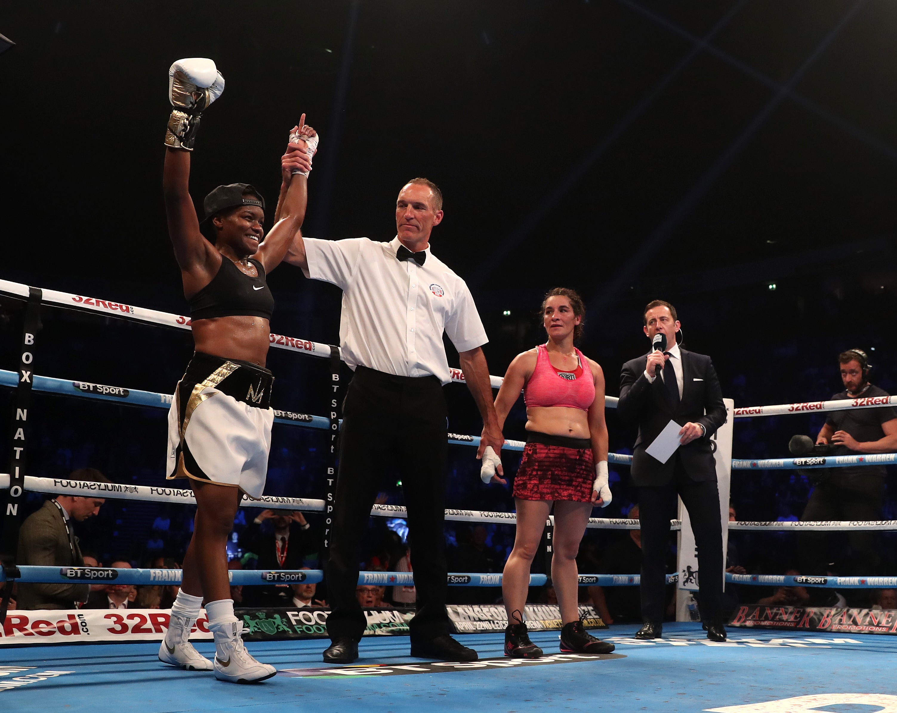 Nicola Adams celebrates her debut victory (PA)