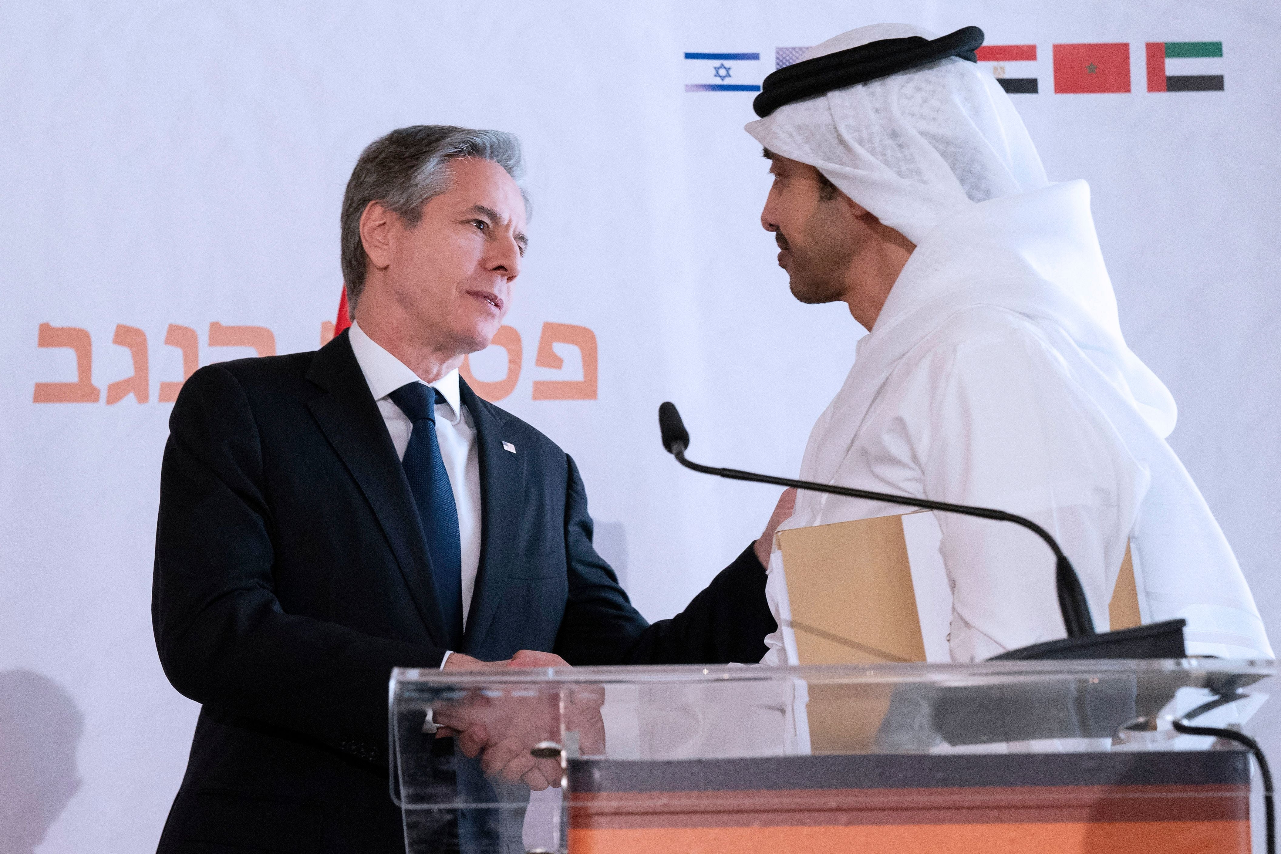 US secretary of state Antony Blinken (L) shakes hands with United Arab Emirates foreign minister Sheikh Abdullah bin Zayed Al Nahyan, in Sde Boker, Israel, 28 March 2022