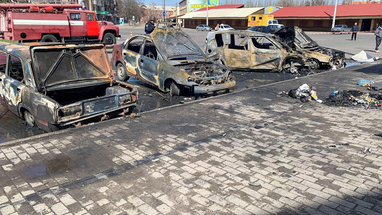 Burnt-out cars after a rocket attack on a railway station in Kramatorsk