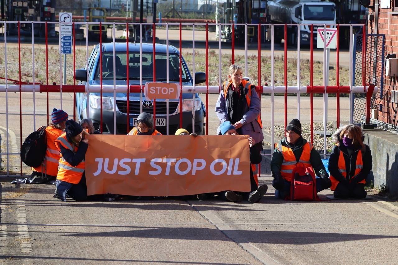 Handout photo issued by Just Stop Oil of protesters who have blocked access to the Titan Truck Park in Grays, Essex, where they claim to have constructed a secret underground network of tunnels at the Navigator and Grays oil terminals. The protesters are demanding that the UK Government stops new oil and gas projects. Issue date: Saturday April 2, 2022. (Handout/PA)