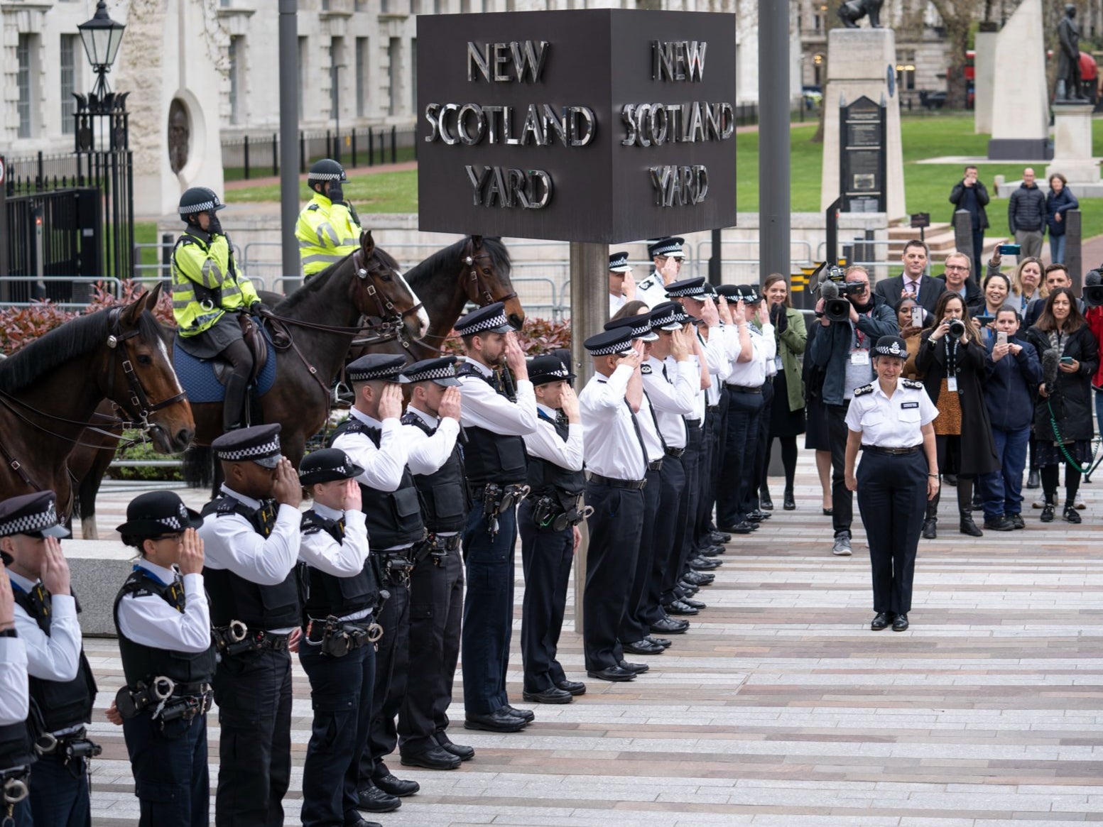 Dame Cressida Dick outside Scotland Yard with an honour guard of officers to mark her departure