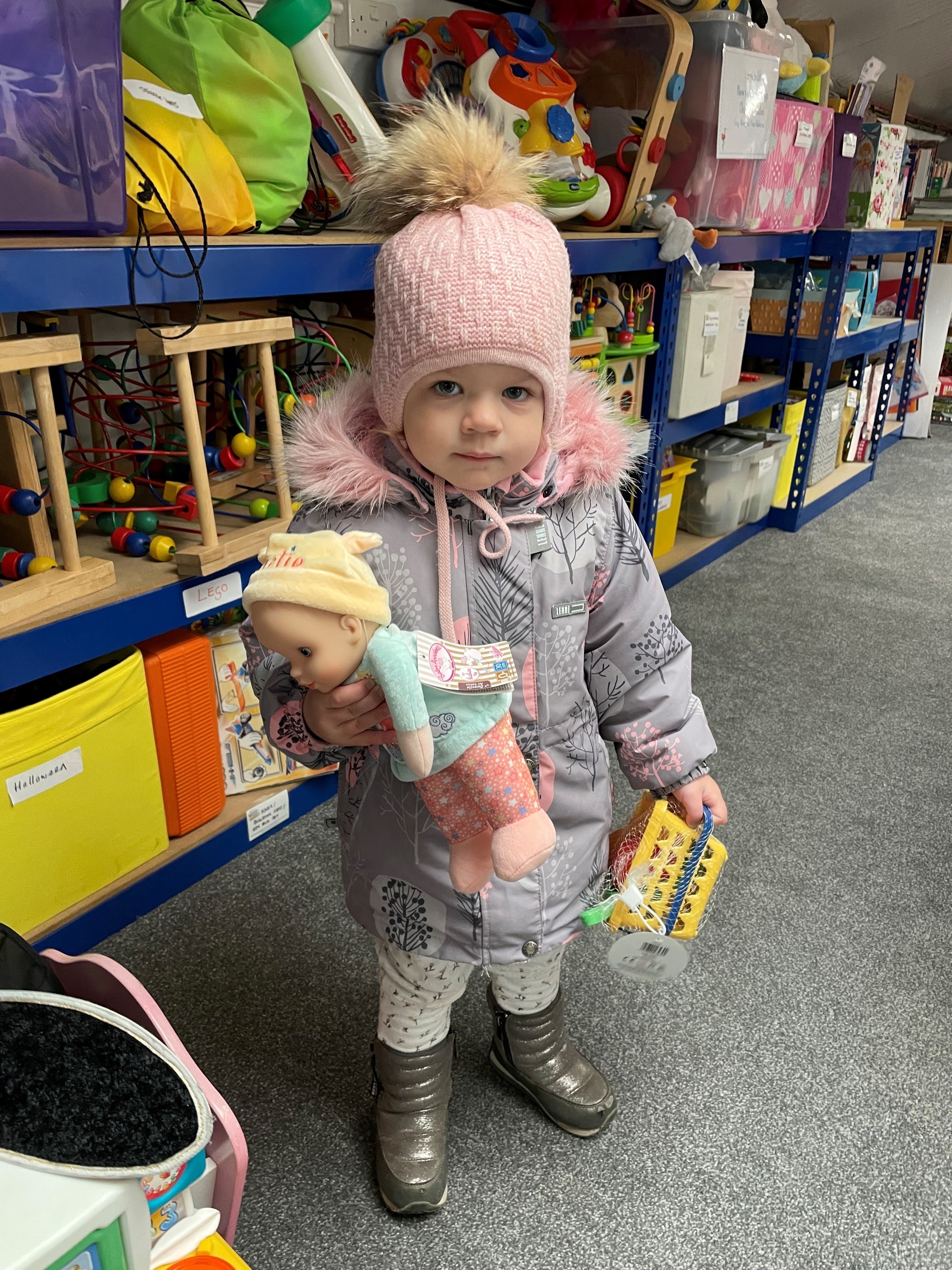 Veronika with her new doll (Stripey Stork)