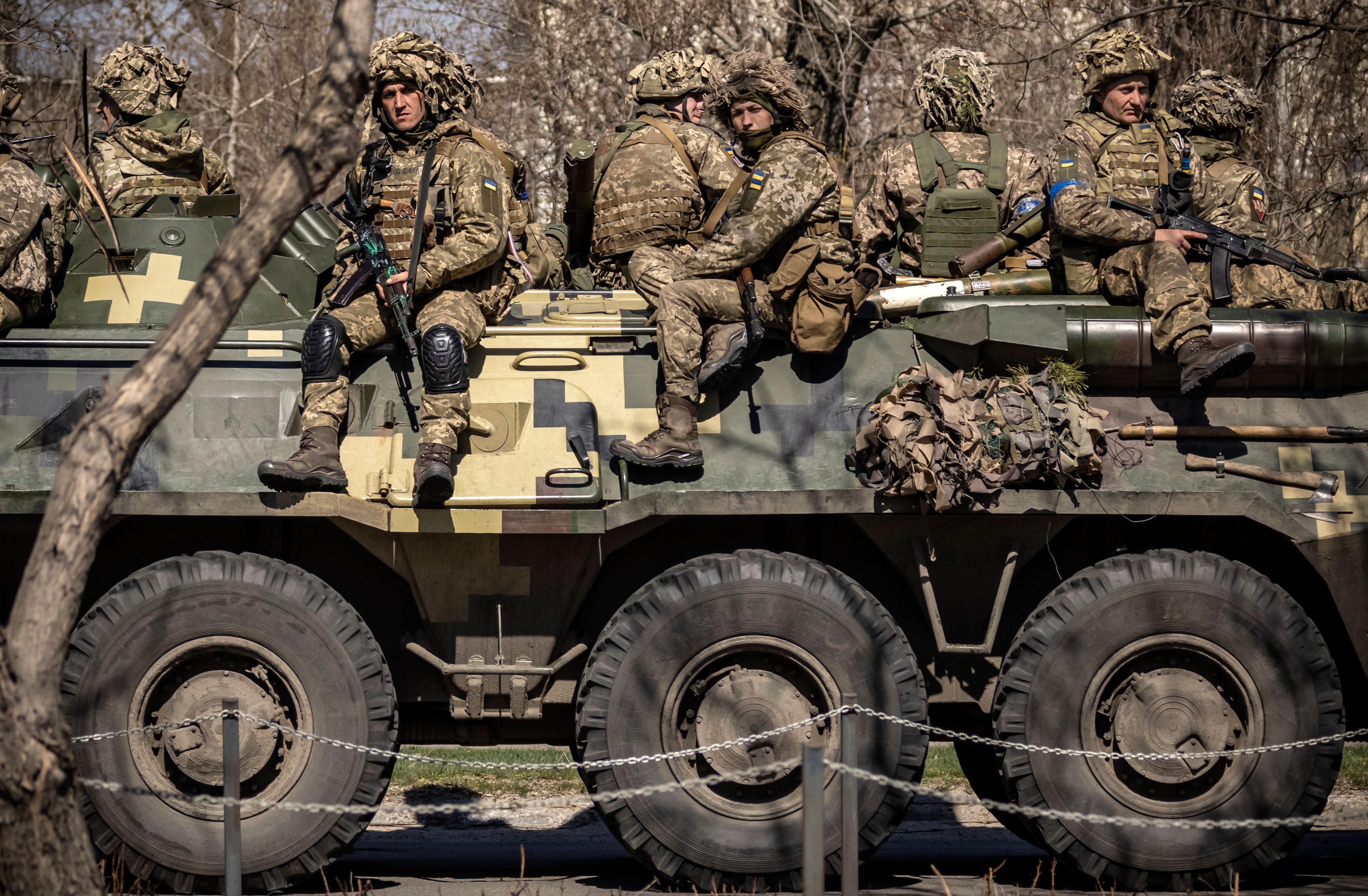 Ukrainian soldiers sit on a armoured military vehicule in the city of Severodonetsk, Donbas region