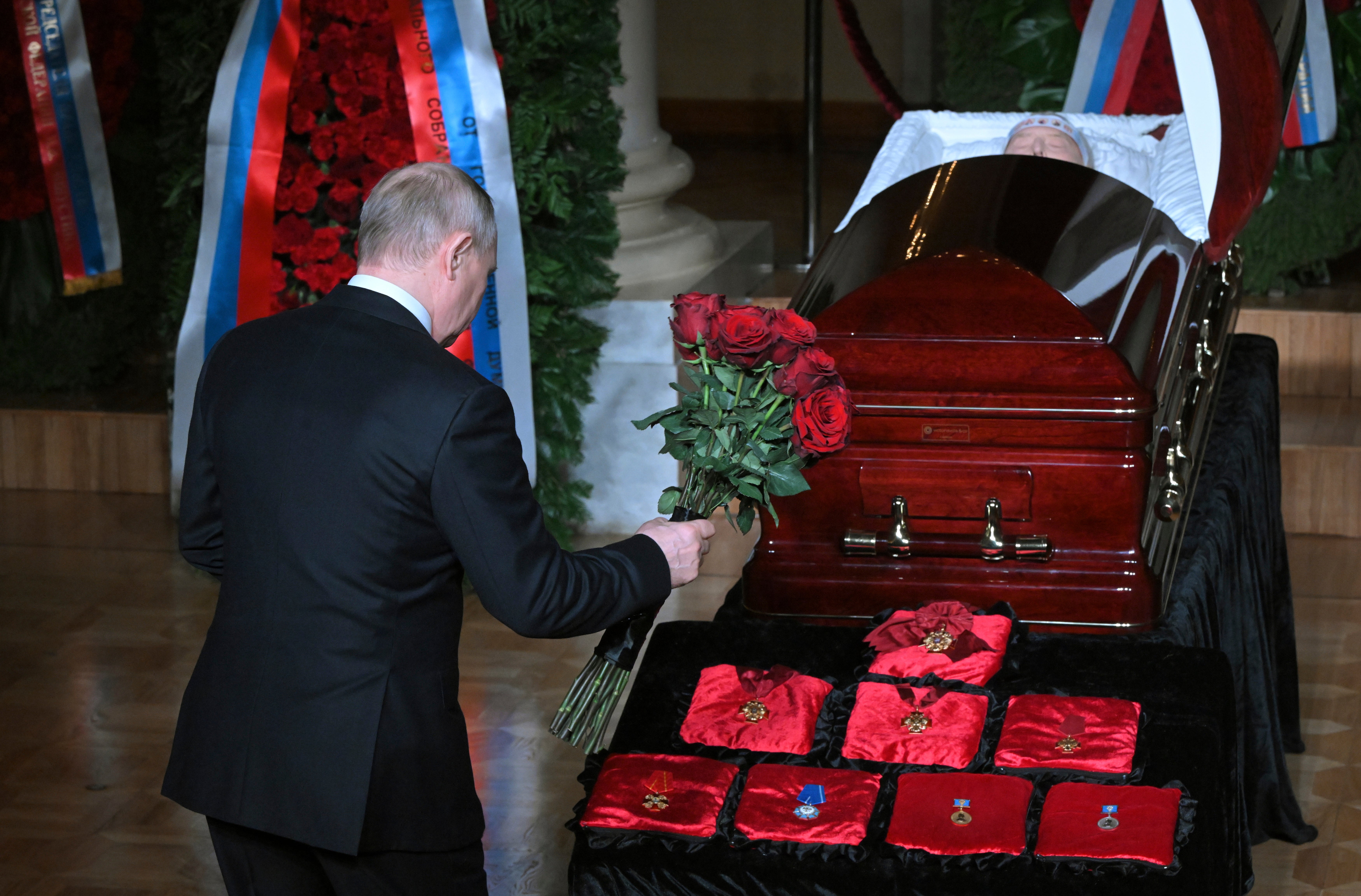 Mr Putin placed flowers on Mr Zhirinovsky’s coffin as he paid his respects