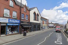 Woman dies after Land Rover hits pedestrians on pavement in Wigan hit-and-run