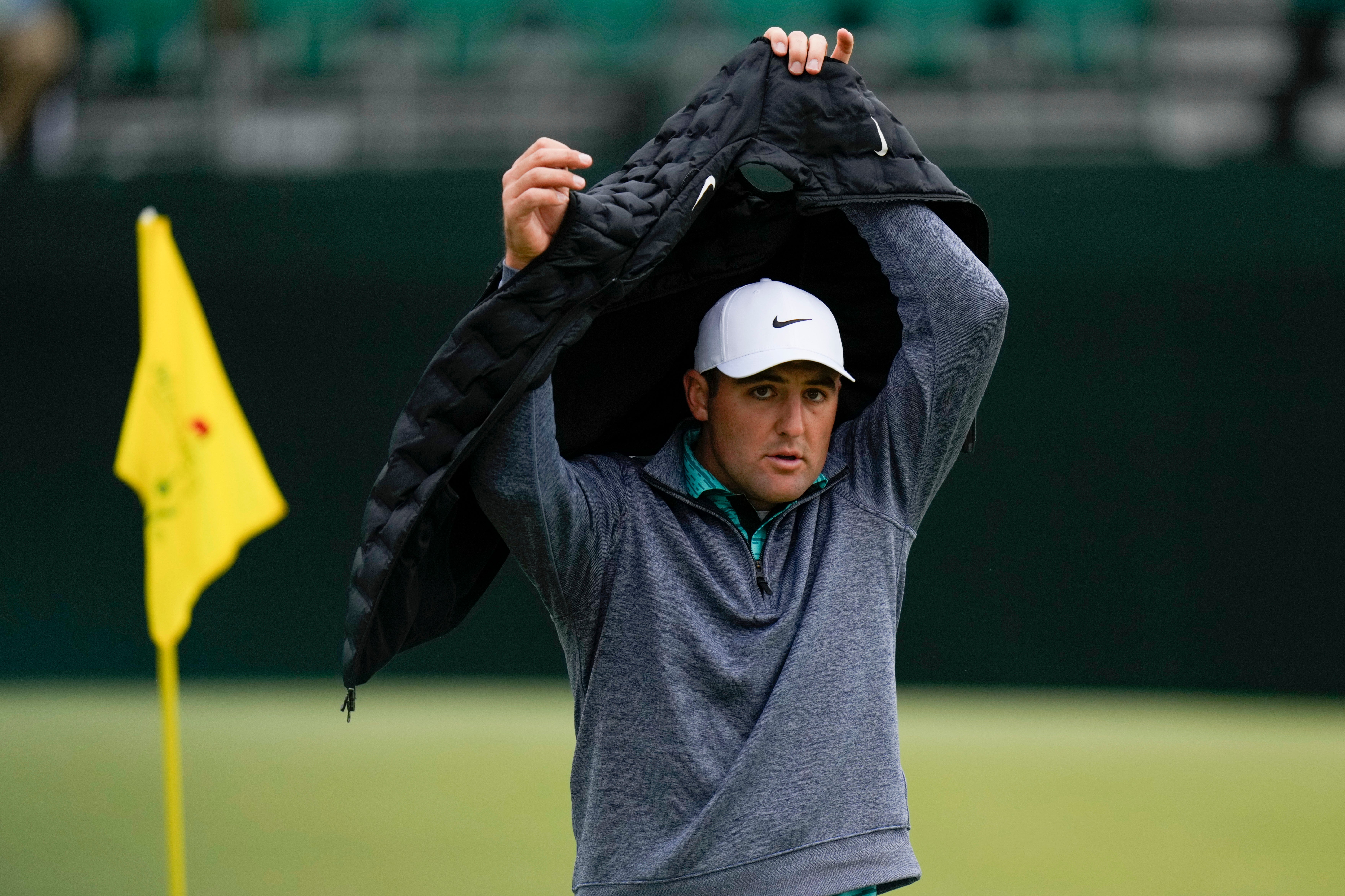 Scottie Scheffler holds a three-shot lead heading into the final round of the Masters (Jae C Hong/AP)