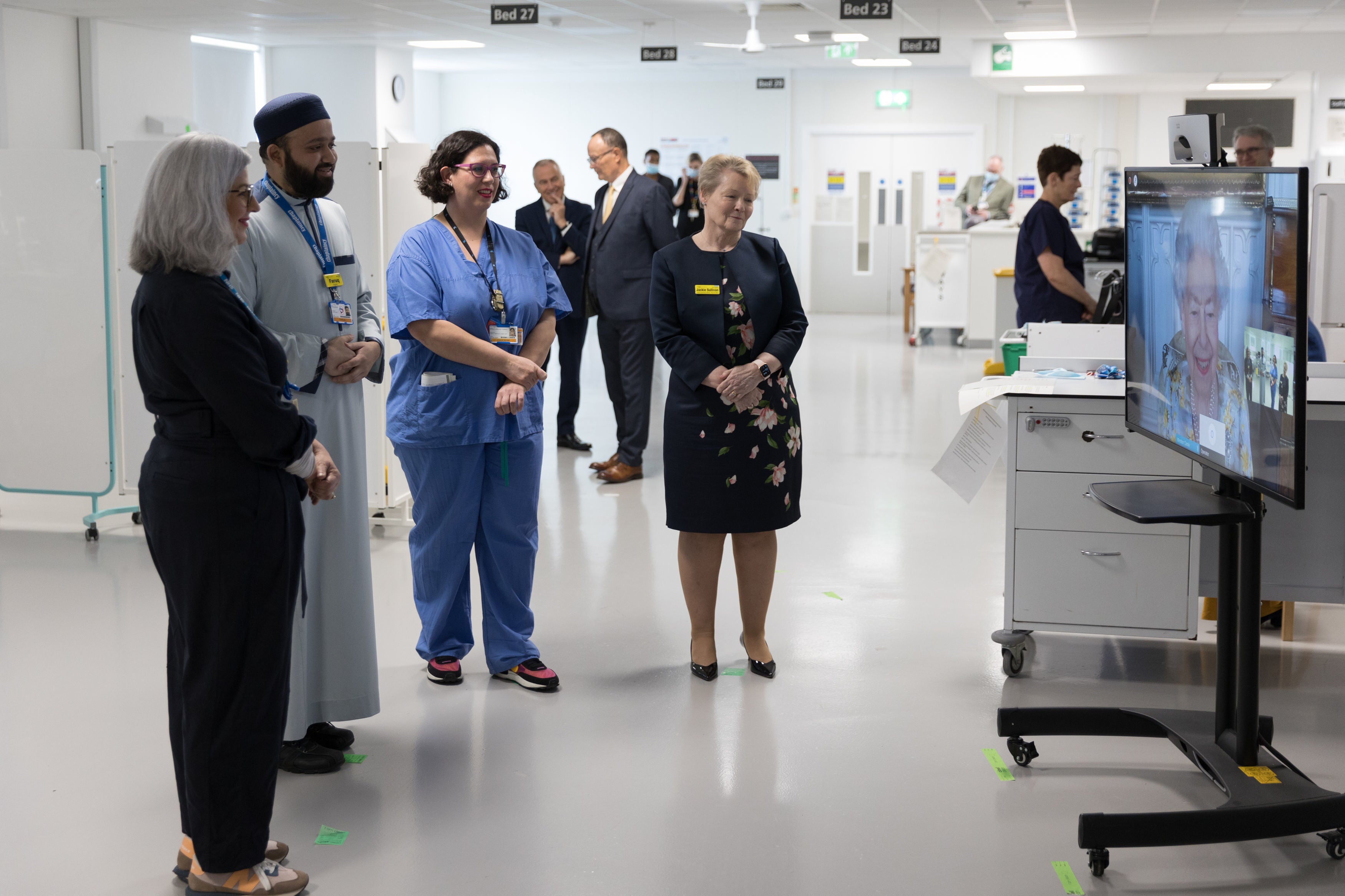 Queen Elizabeth II speaking to staff during a virtual visit to the Royal London Hospital to mark the official opening of the hospital's Queen Elizabeth Unit