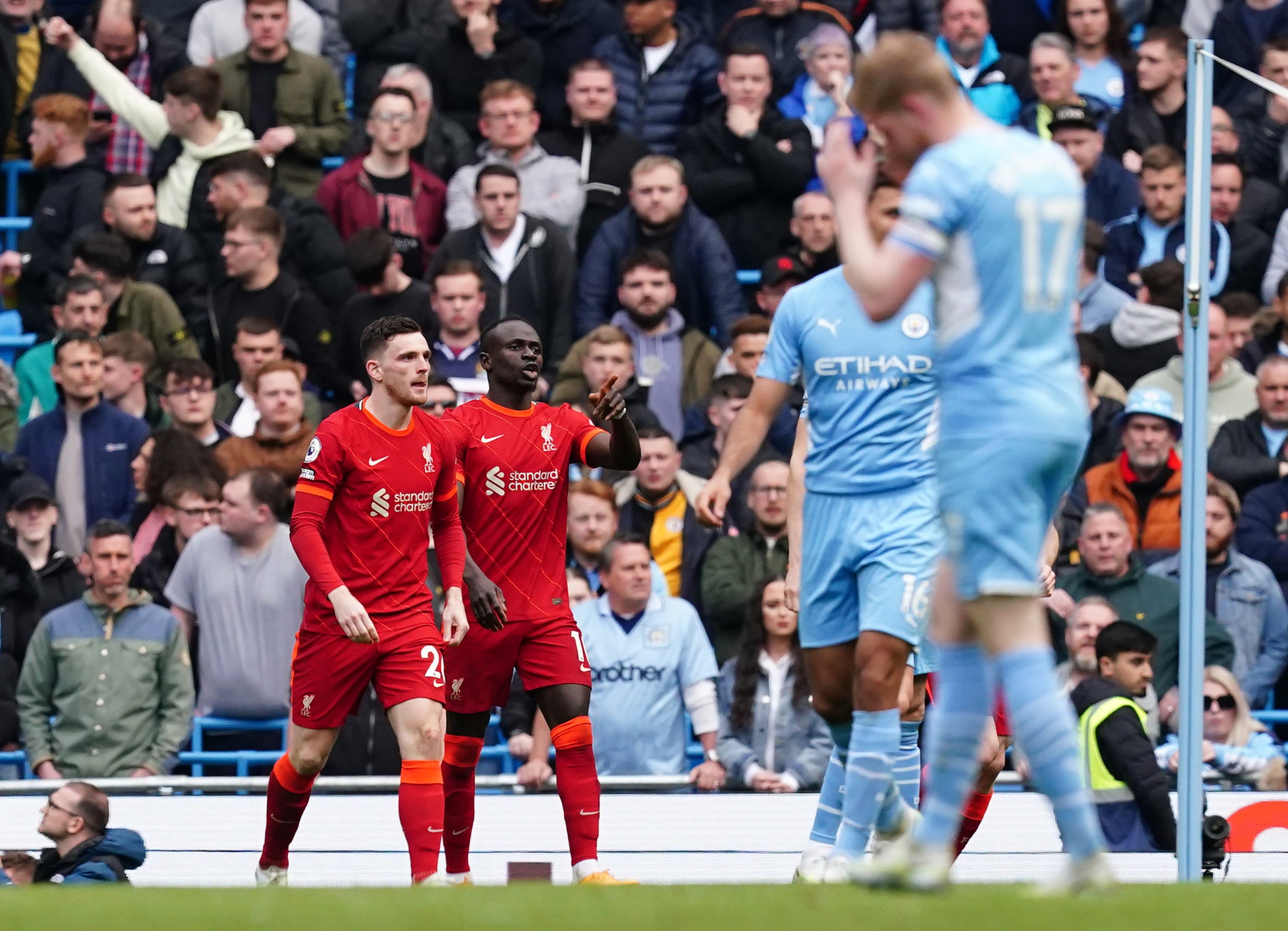 Liverpool came from behind twice to earn a point in their vital clash at Manchester City (Martin Rickett/PA)